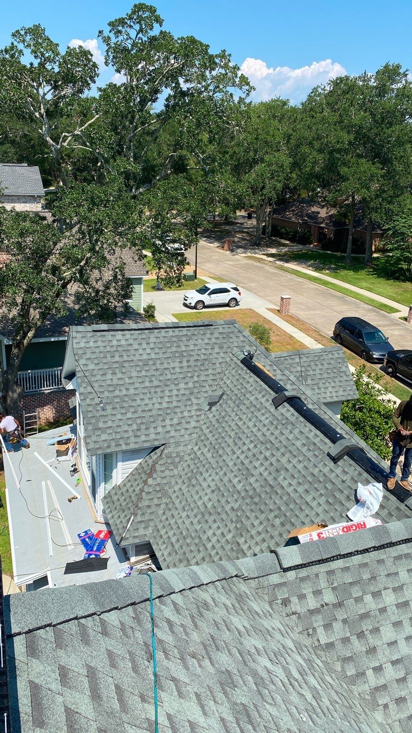 Residential Roofing Installation using Roof Replacement by American Roofing & Construction LLC