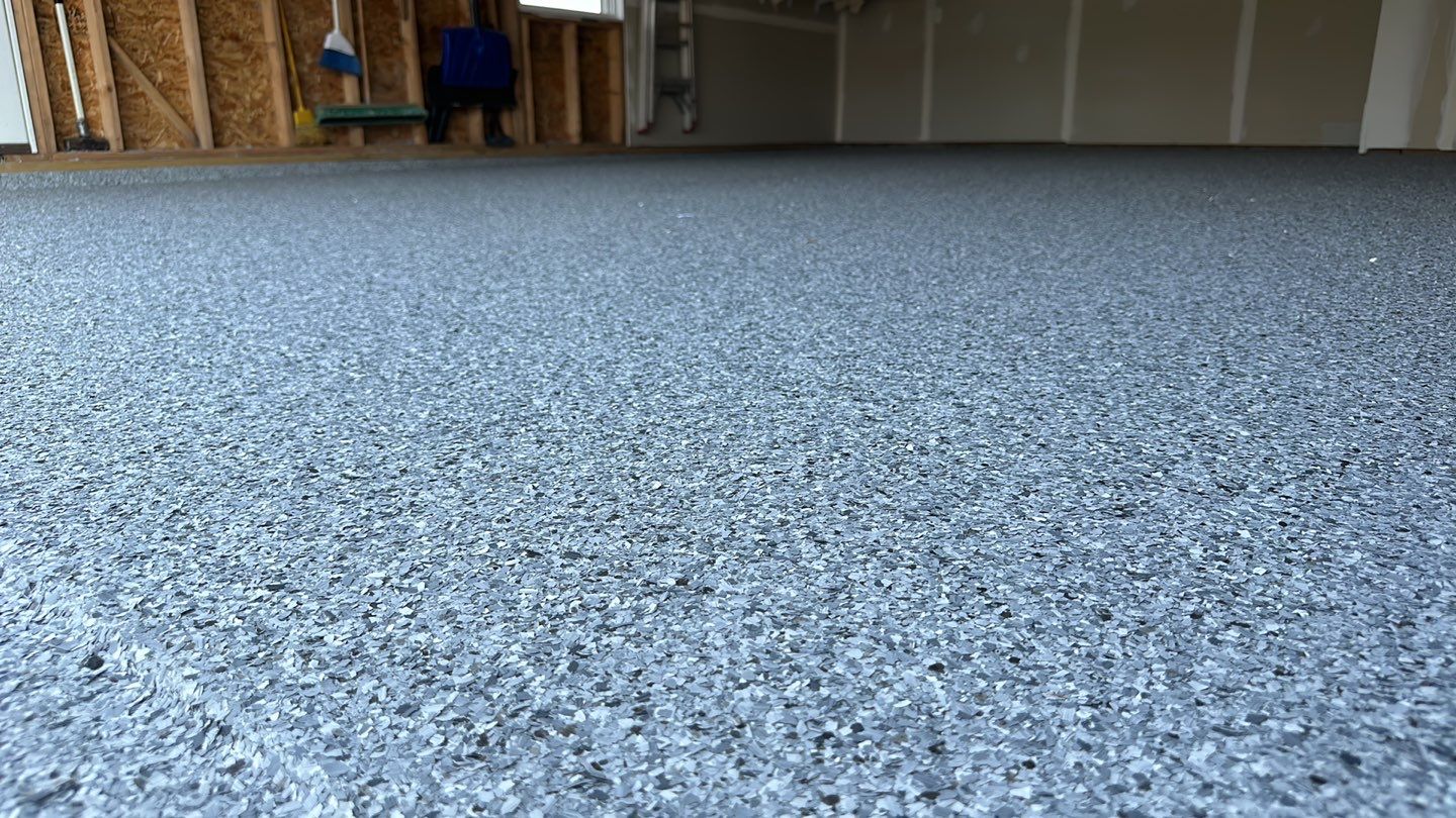 Silverado garage floor coating  by NG Masonry & Construction LLC