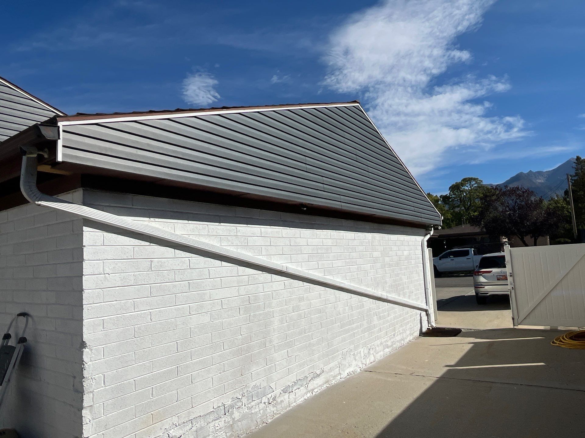 Sandy | Cedar Overlay Vinyl Installation | Nightfall & White by Ideal Siding Utah