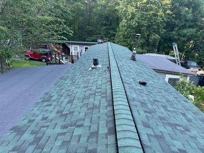 Milton, NH – Green Asphalt Shingle & Rolled Roofing Installation