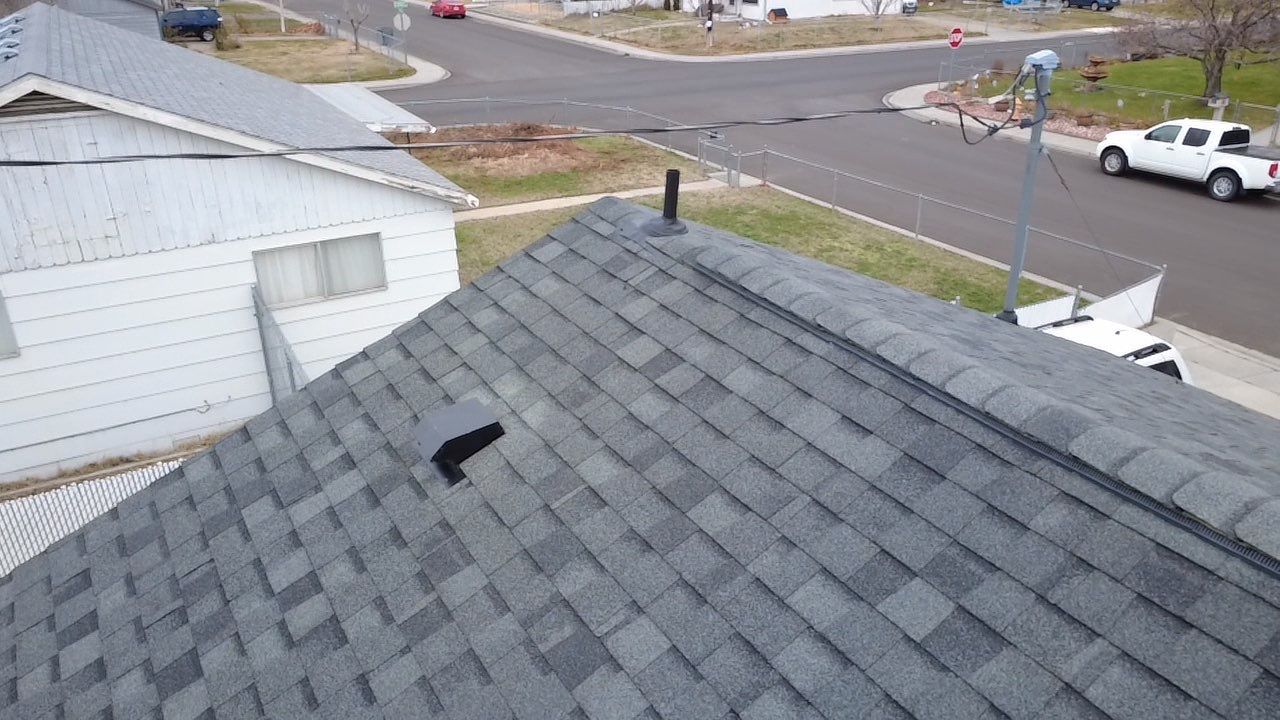 Residential Roofing Installation Featuring Granite Gray Shingles in Richland by Alpine Roofing