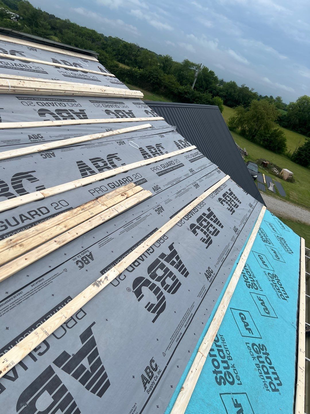 Residential Roofing Installation using Performance Panel Metal - Frost Black by RoofX 