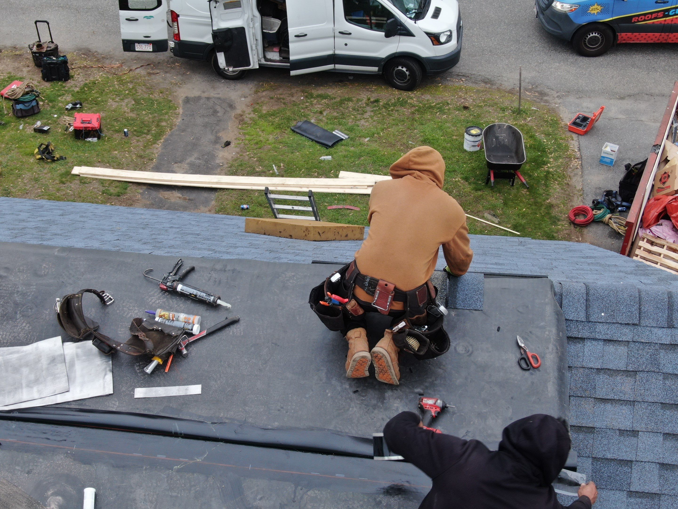 Roof and Flat Roof Membrane Replacement in Lowell, MA by Mighty Dog Roofing of Greater Middlesex County