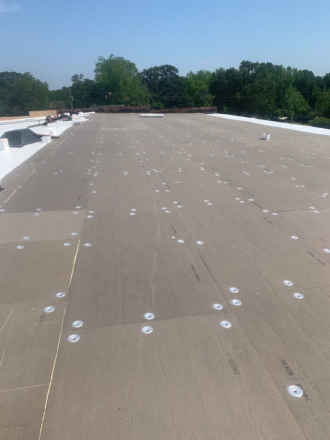 Commercial Roofing Installation using 50 mil PVC by Hostetler Roofing