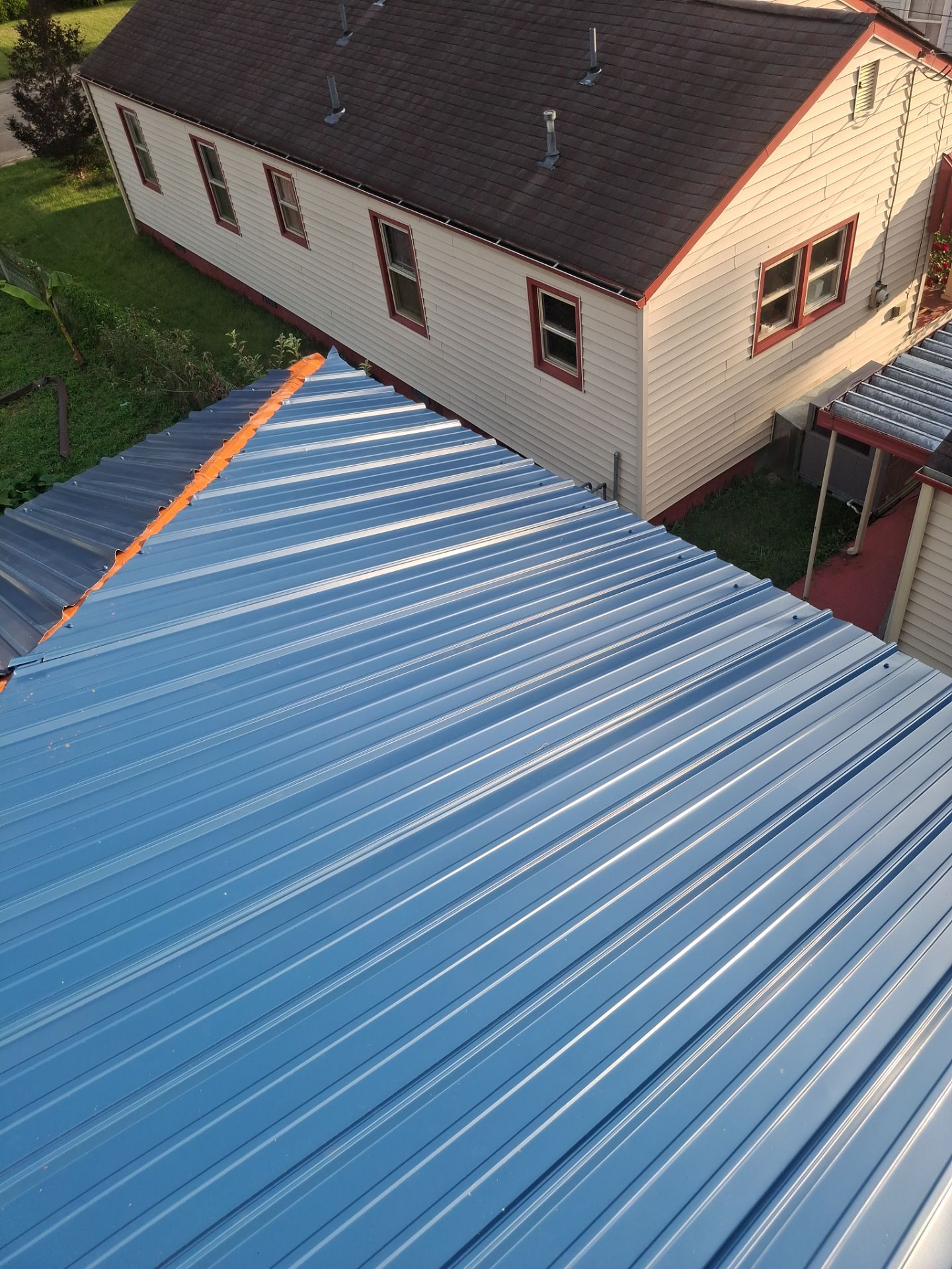 Residential Roofing Installation using Metal by Rainstoppers Roofing