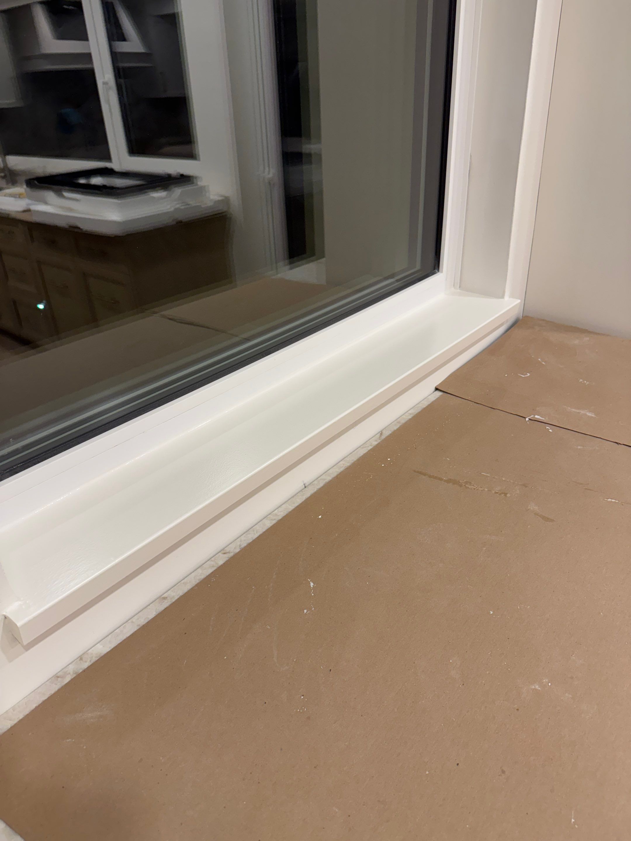 West Vancouver Custom Millwork: Heat Pump Trim & Window Finishing by YVR Construction Group