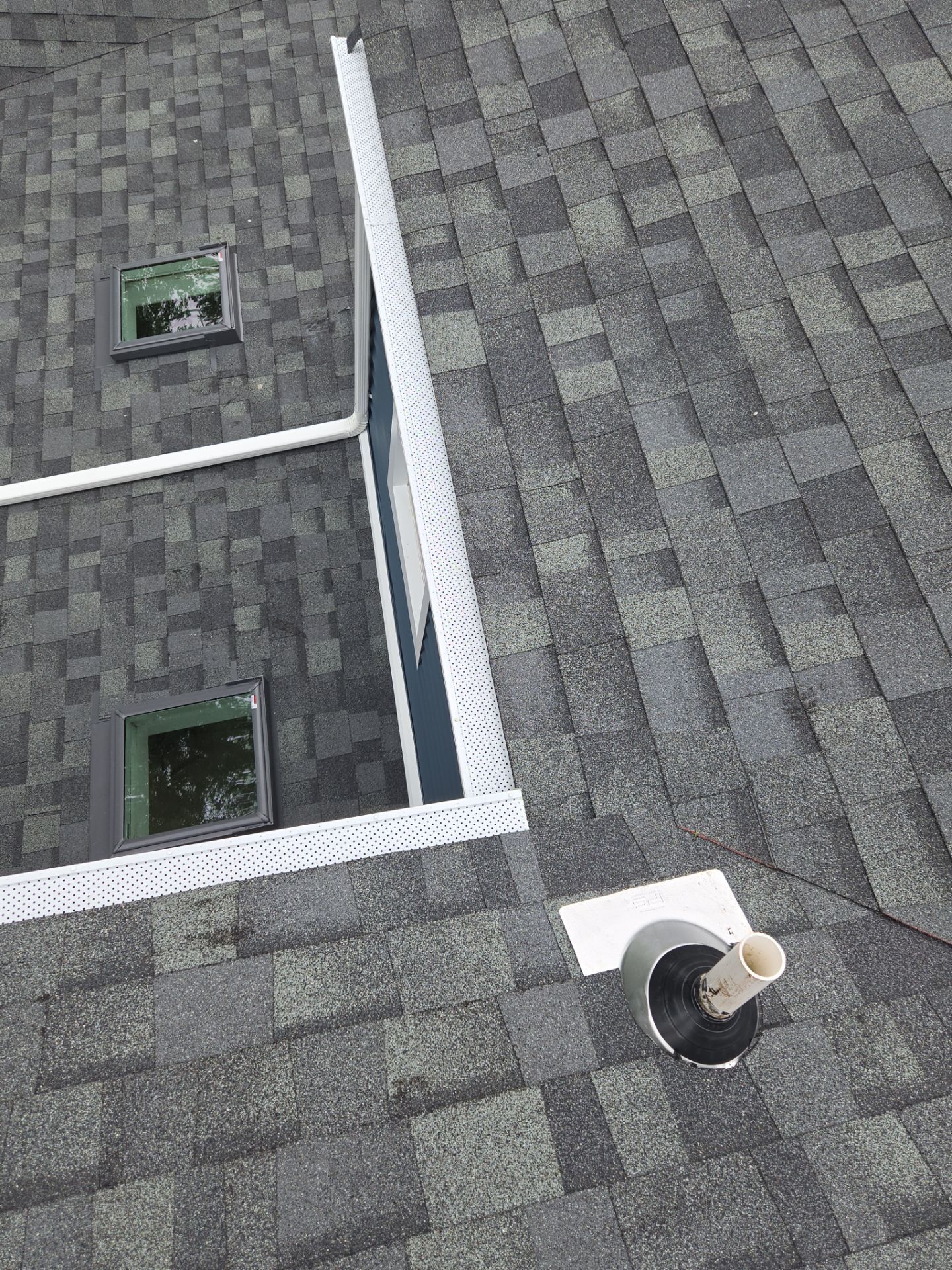 Complete Exterior Estate gray with Pacific Blue Siding by A Plus Exterior