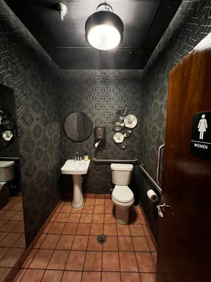 Commercial Restaurant Restroom Renovation Featuring Patterned Wallpaper in Smyrna