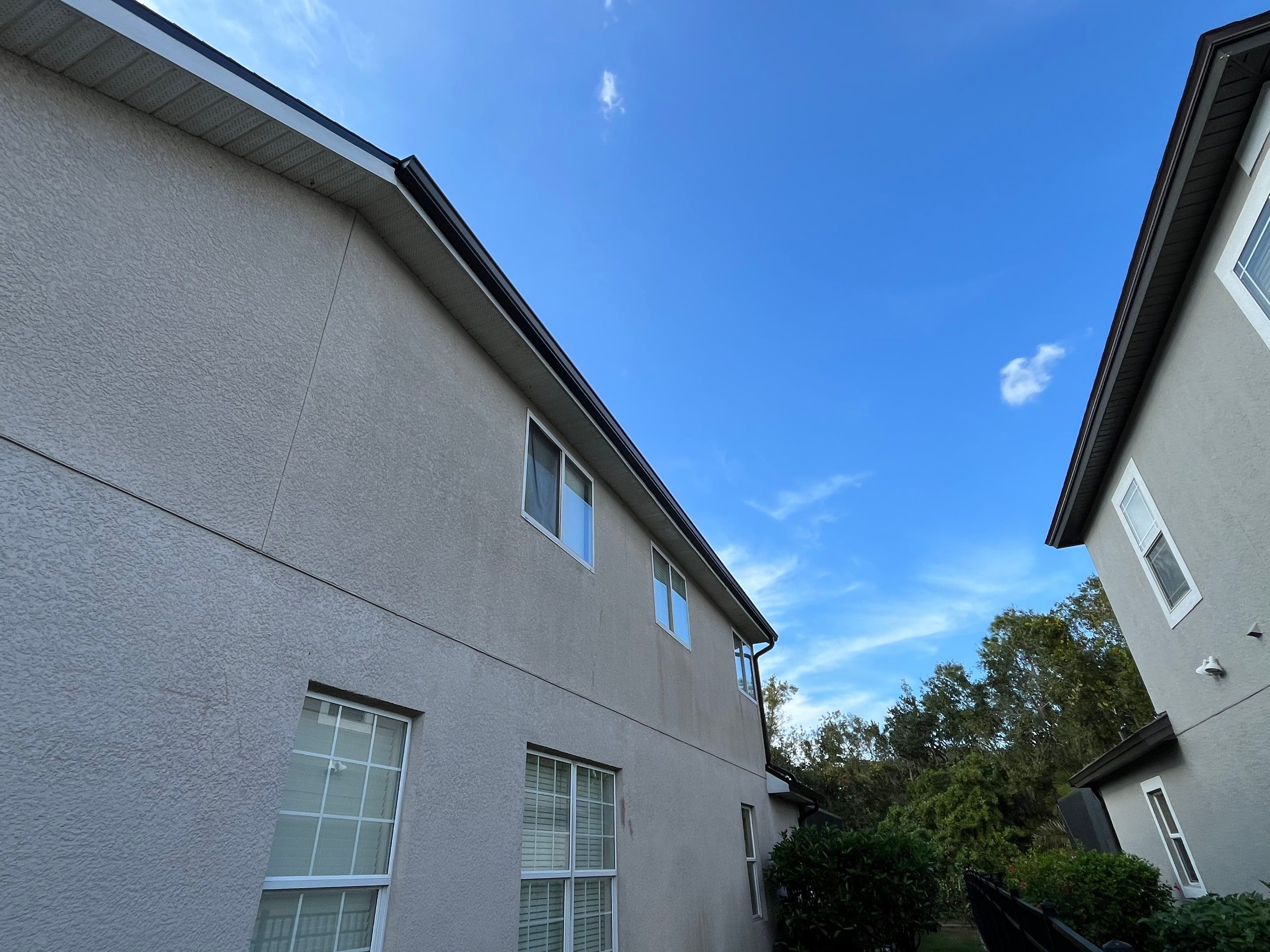 Black 6-inch Seamless Gutters for Modern Ellenton Homes FL by Gutter Professors