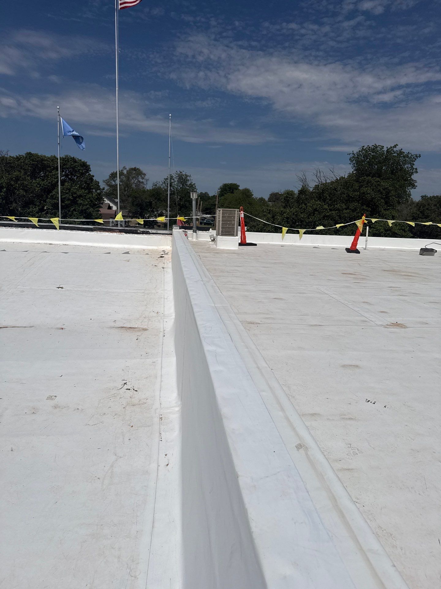 Hollis High School Comprehensive TPO Roof Replacement and Restoration by Secondary Rhodes