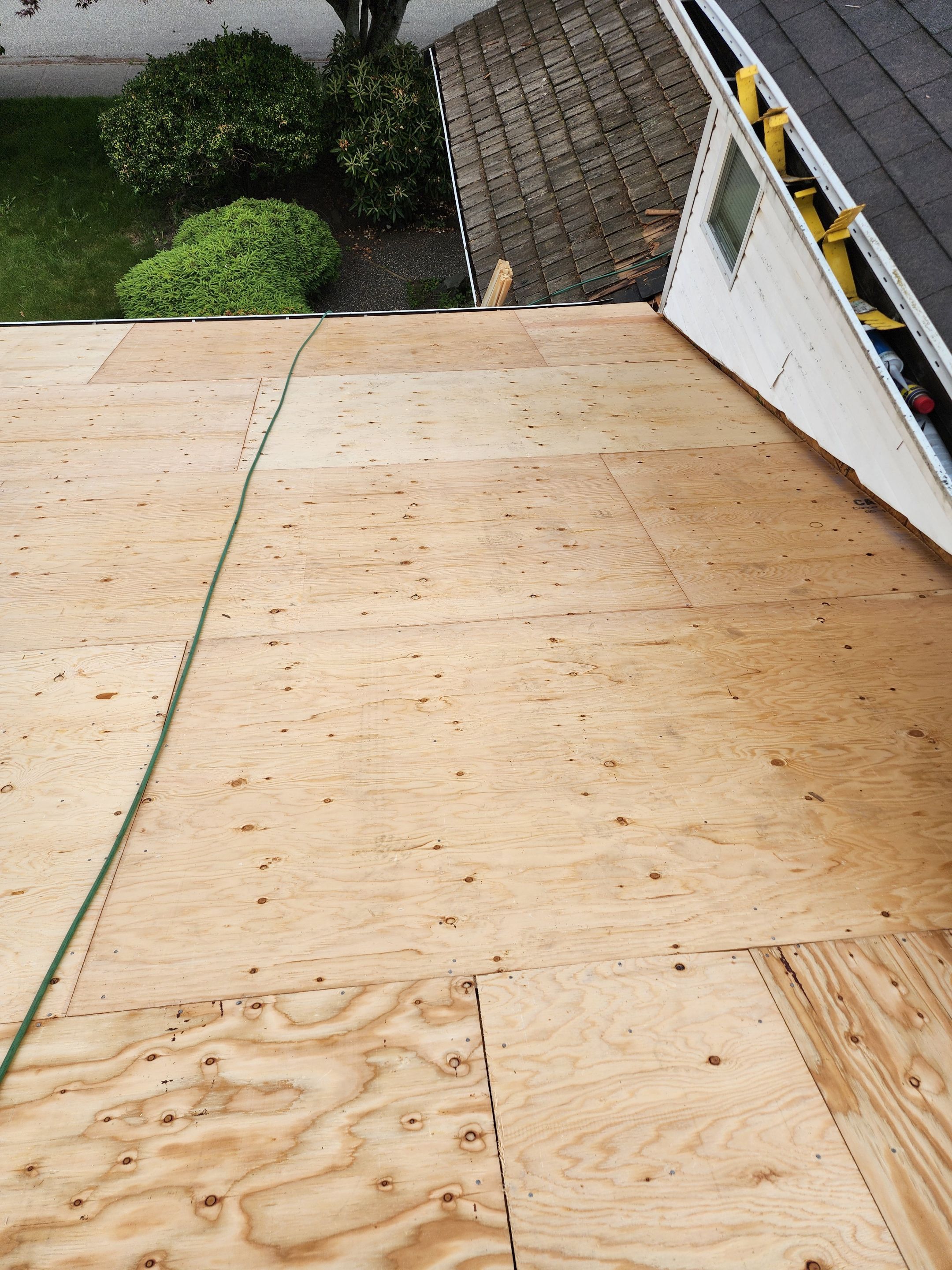 Residential Cedar ReRoofing Installation using OC Oakridge shingles by Top Notch Roofing Inc