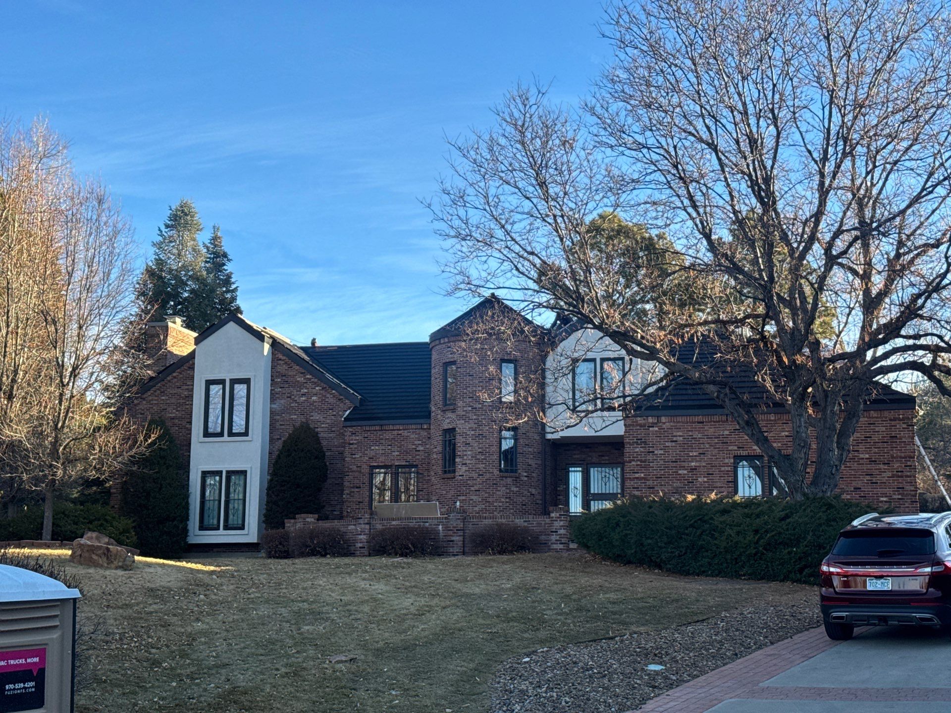 Unified Stone Coated Roof & Stucco Remodle by Blue Peaks Roofing LLC