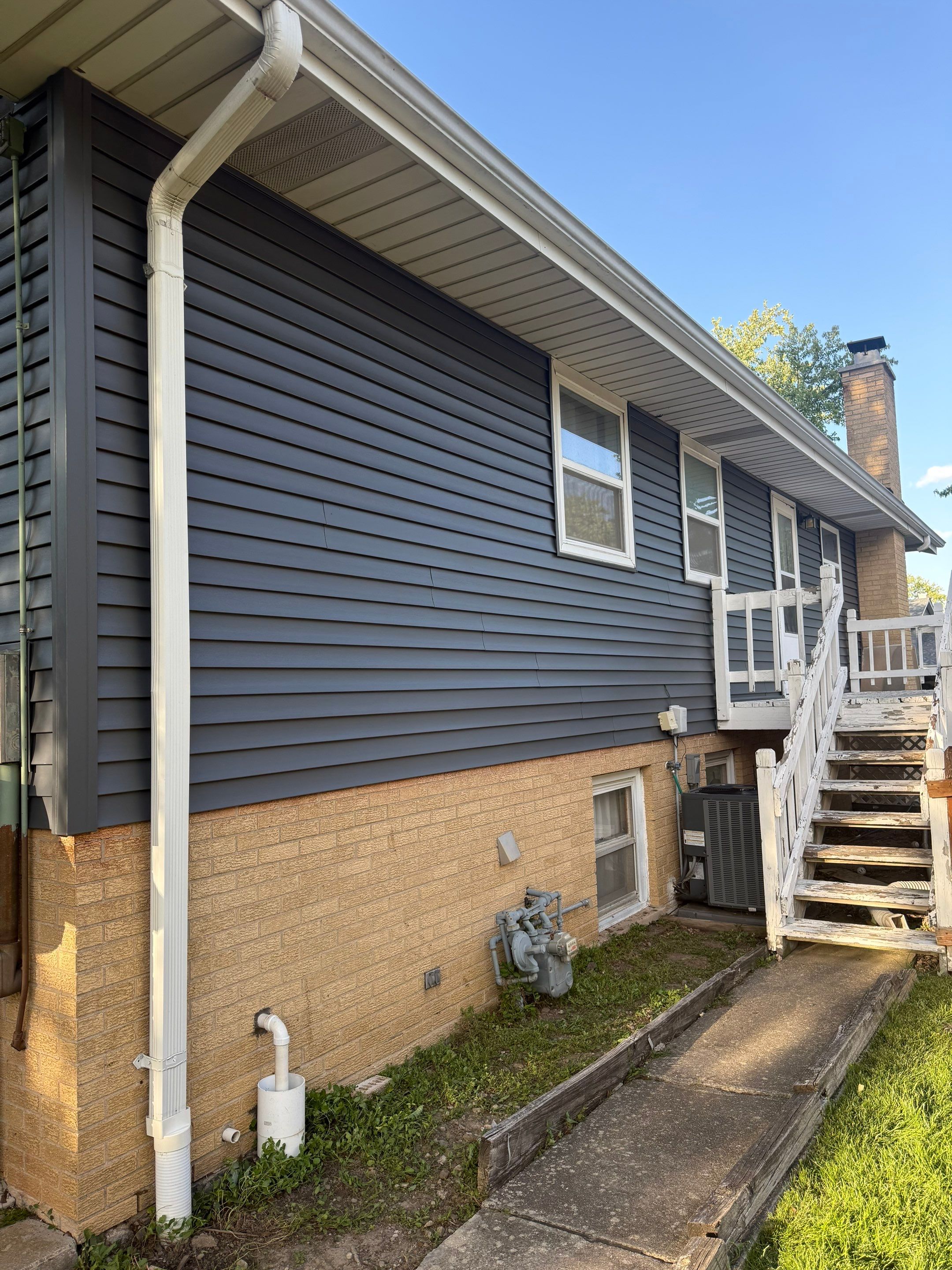 Roof replacement and chimney flashing by Optimal Home Improvement 