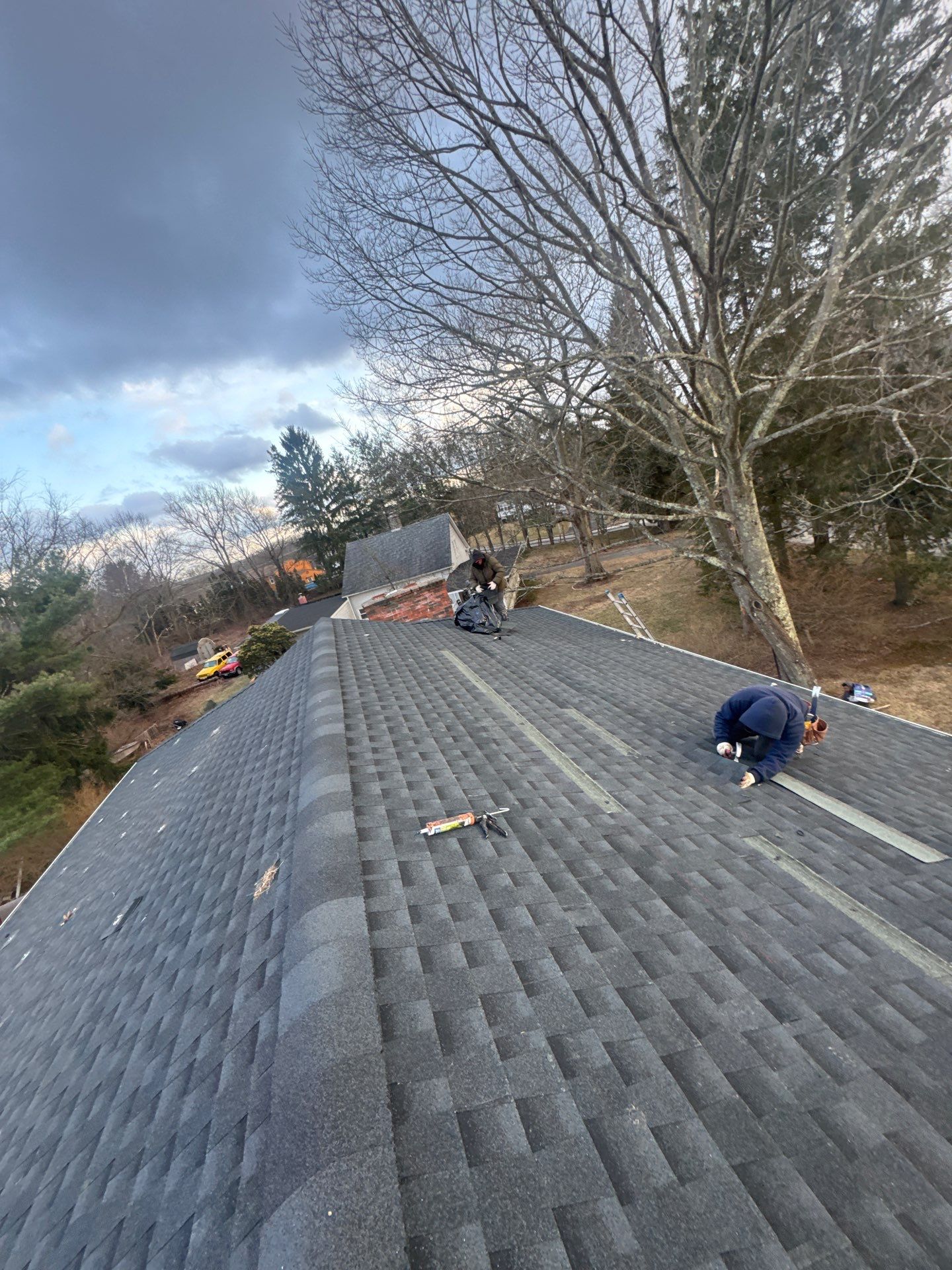 Estate Gray Shingles by Reimagine Roofing