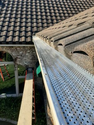 Seamless Gutter Installation with Wicker Color K-Style Gutters and LeafBlaster Pro Mesh Gutter Guards