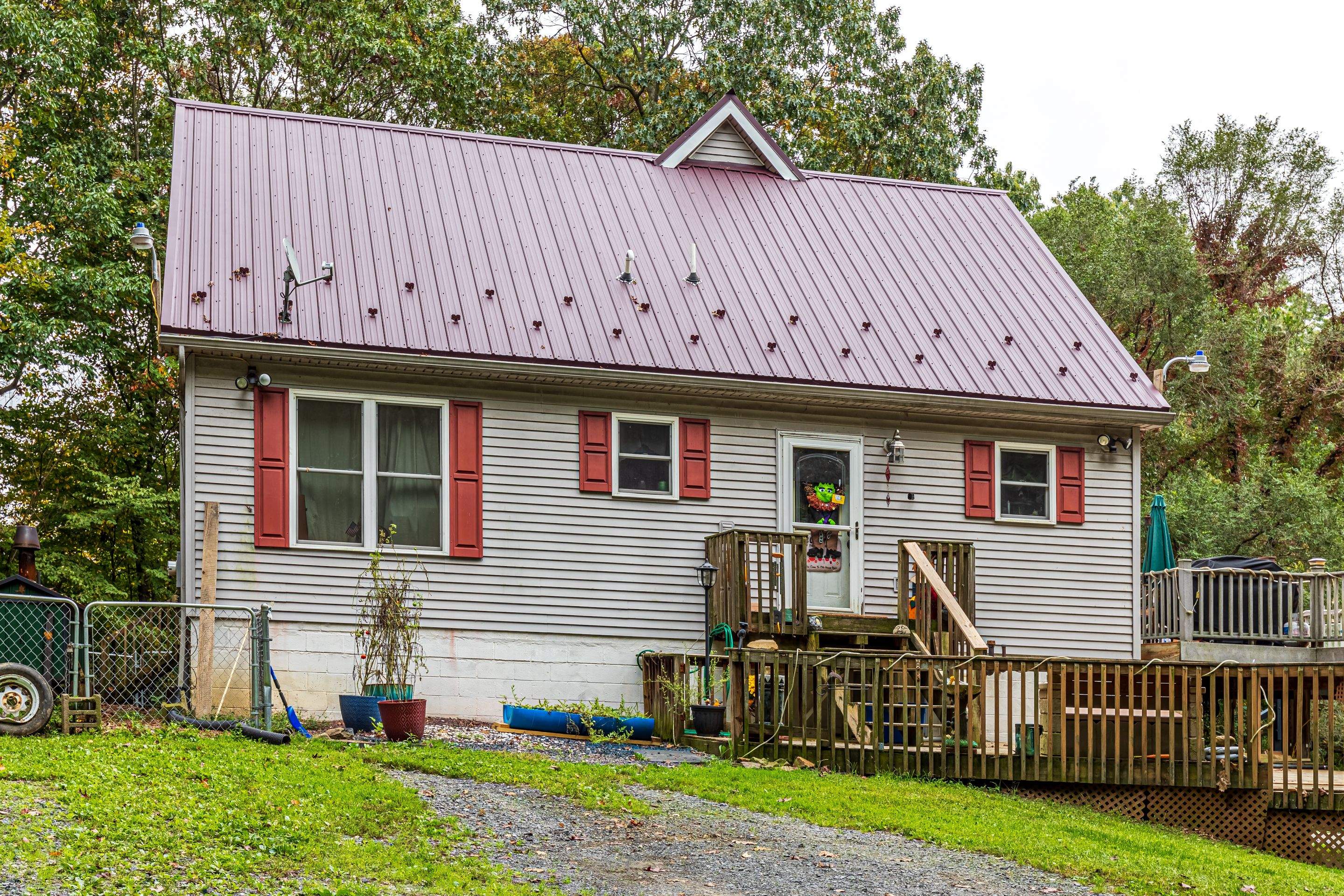 Metal Roof-burgundy by Esh Builders