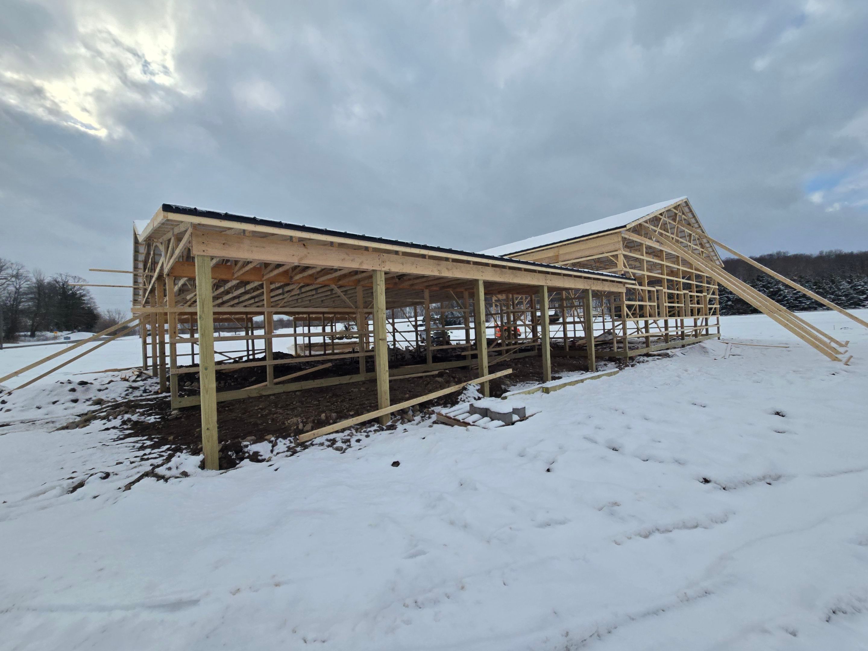 Barndominium  using Textured Board & Batton by Horst Custom Homes 