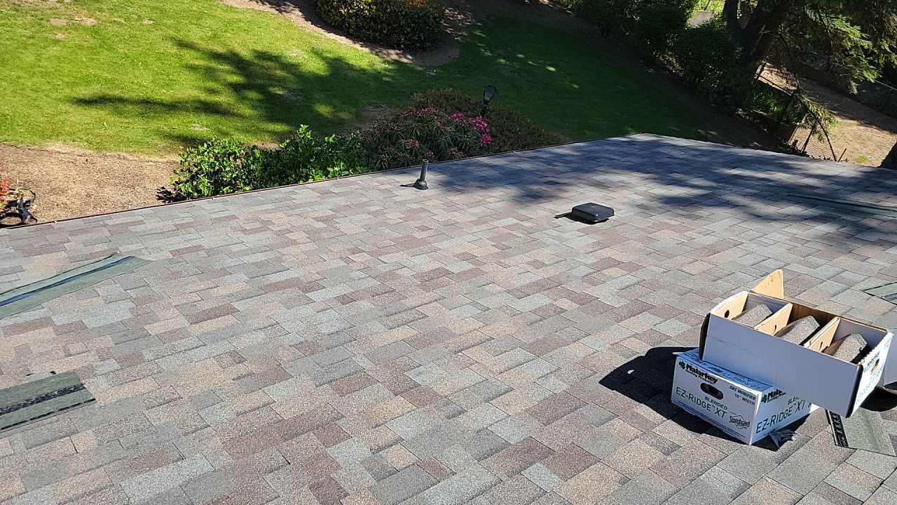 Residential Roofing Installation using Malarkey Highlander with GAF 60mil TPO by Orezona Building & Roofing Company, Inc.