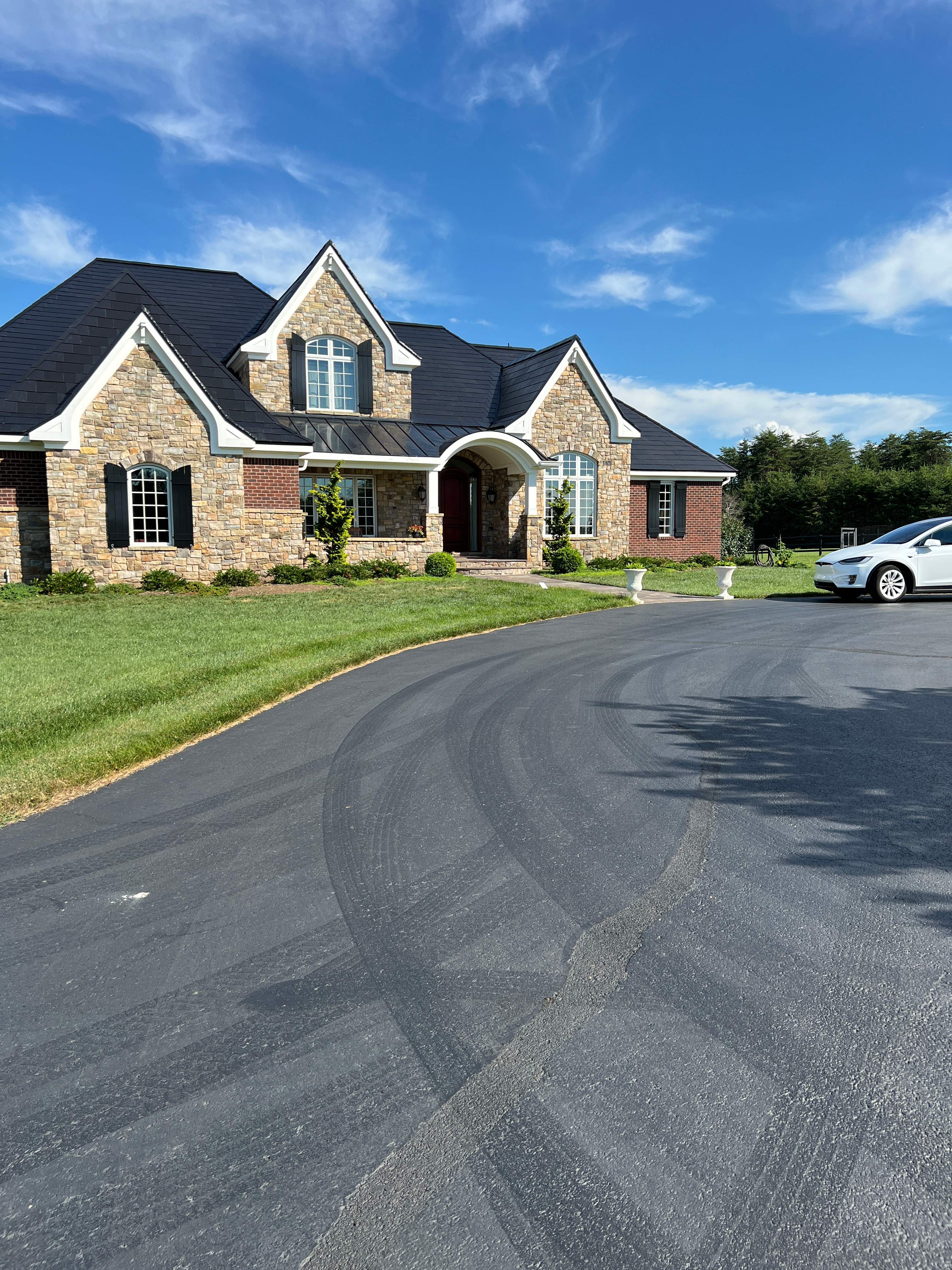 Tesla Solar Roof Manassas, VA by American Home Contractors