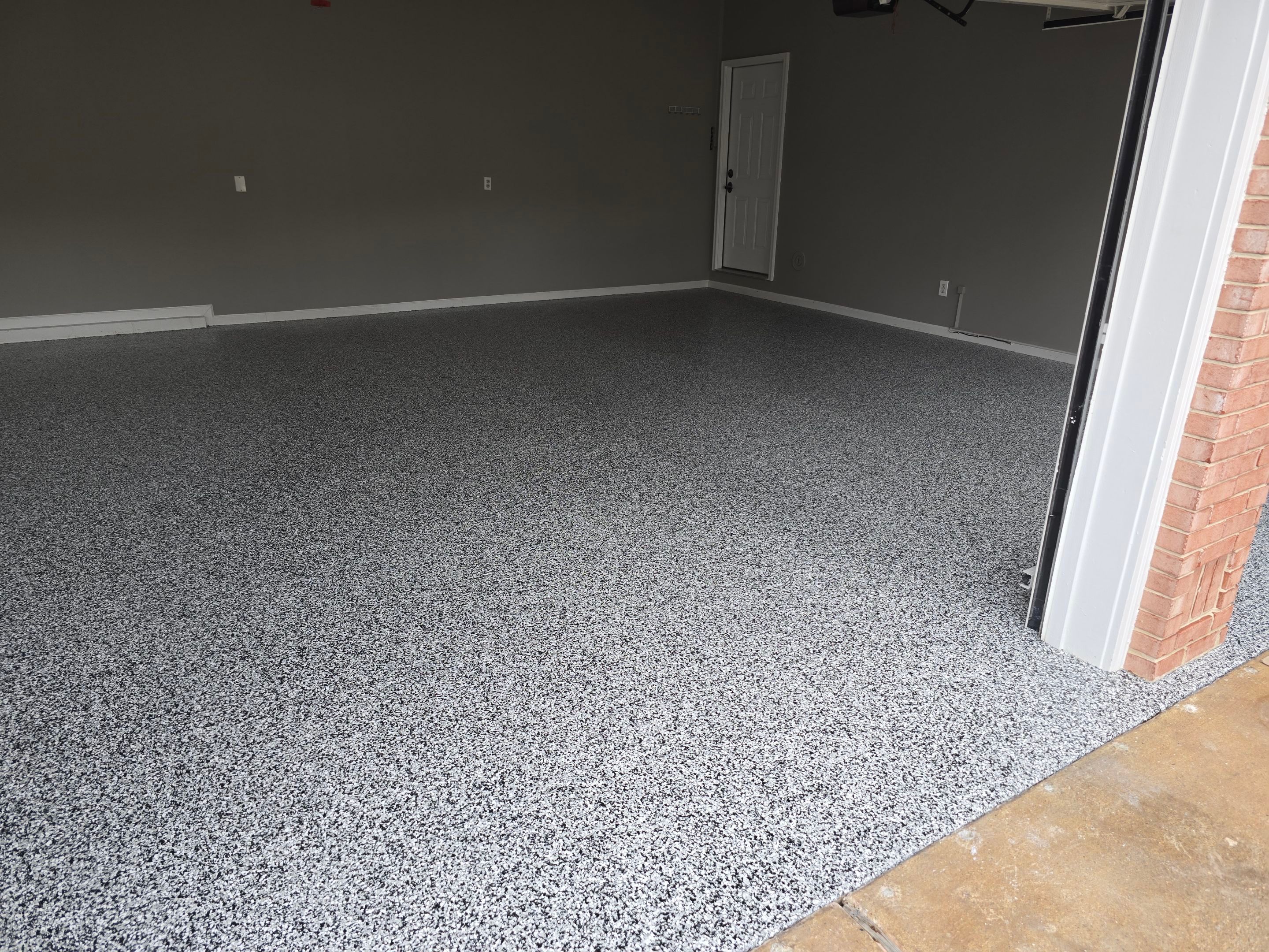 Garage using Domino by Elite Floor Solutions