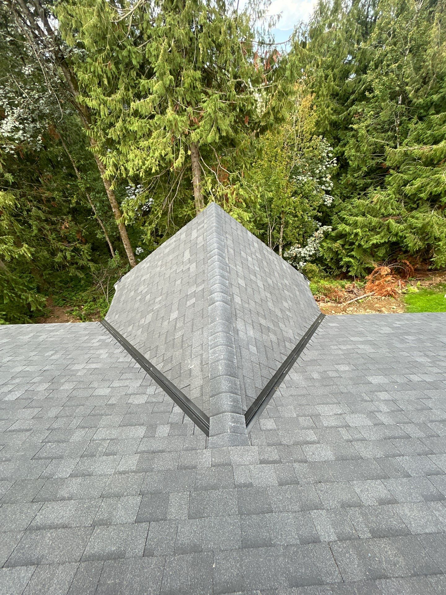 Residential Roofing Installation using OC Oakridge shingles by Top Notch Roofing Inc