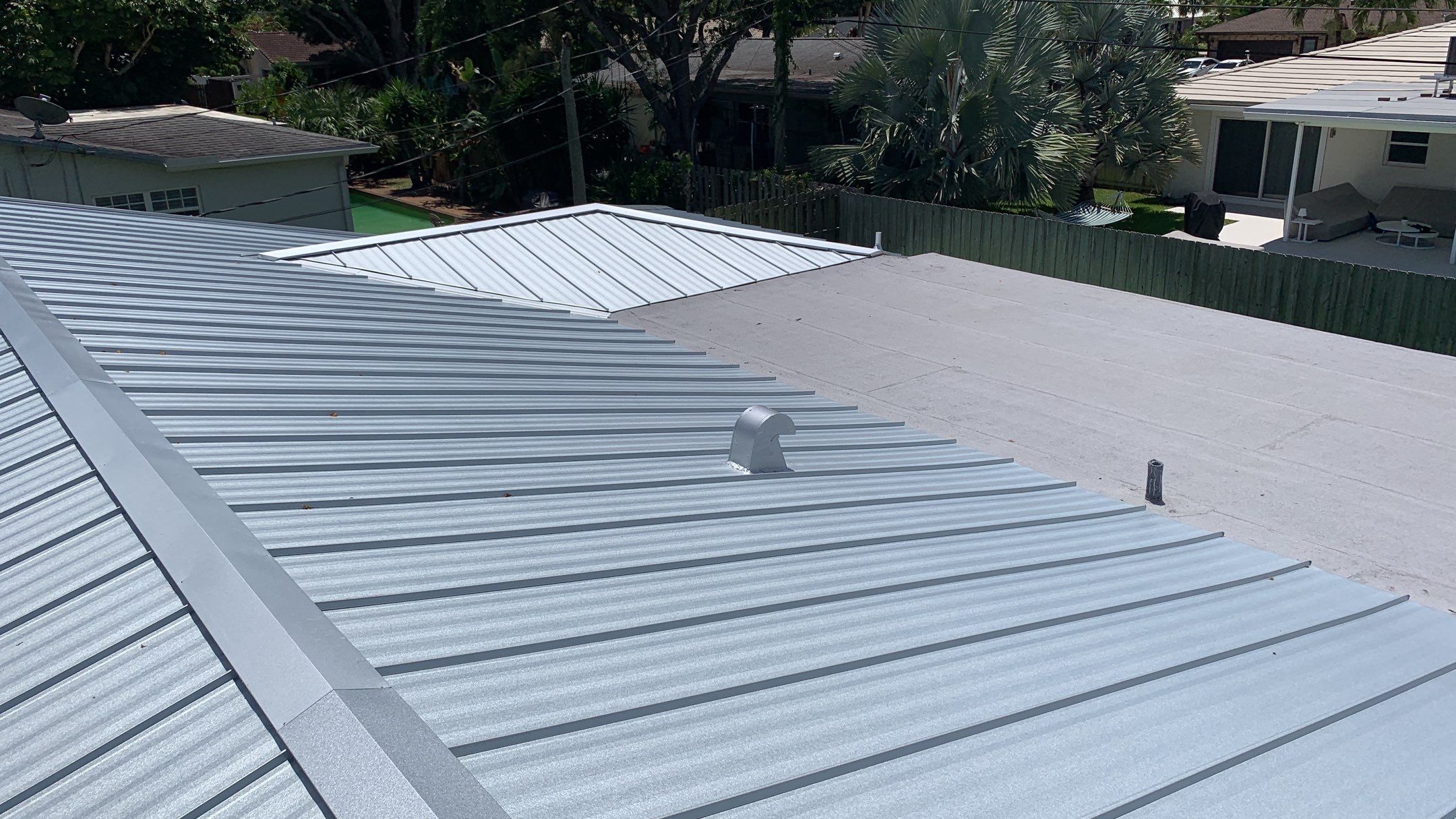 Residential Roofing Installation using 1" Nail strip metal roof by BLUES BROTHERS CONSTRUCTION CORP