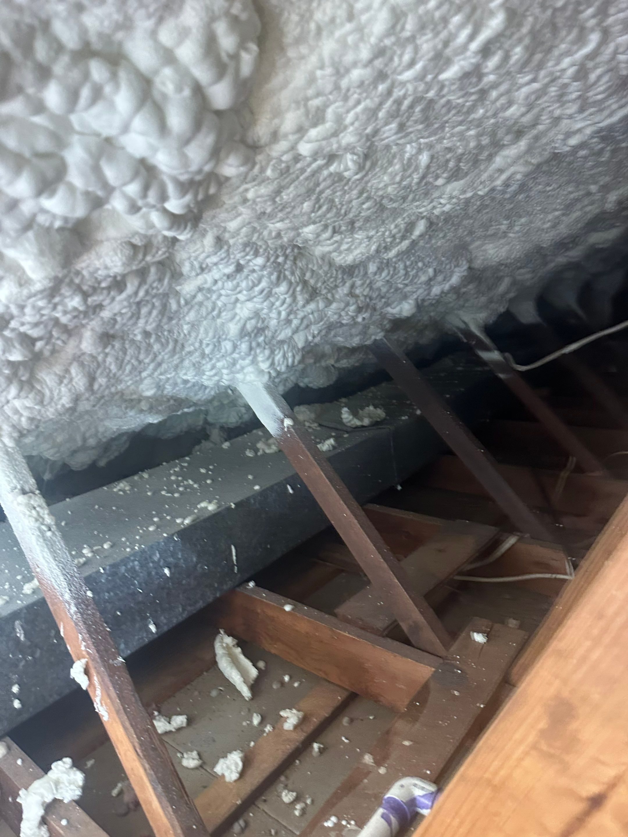 Rim Joist using open cell spray foam by NYS Foam & Energy