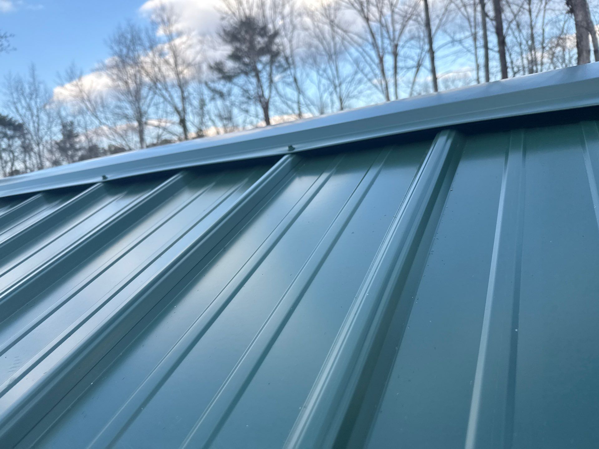 Metal Roof and Gutters Replacement in Hueytown by The Roofing Dudes