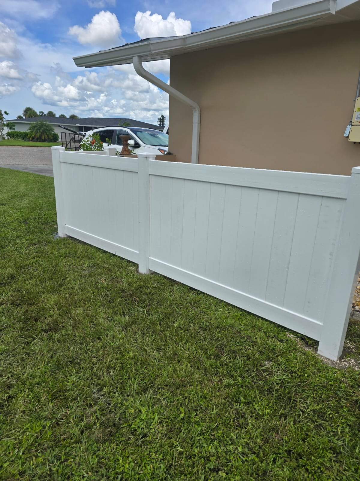 Residential White Vinyl Privacy Fence Enclosure in Rotonda West by True Fence LLC
