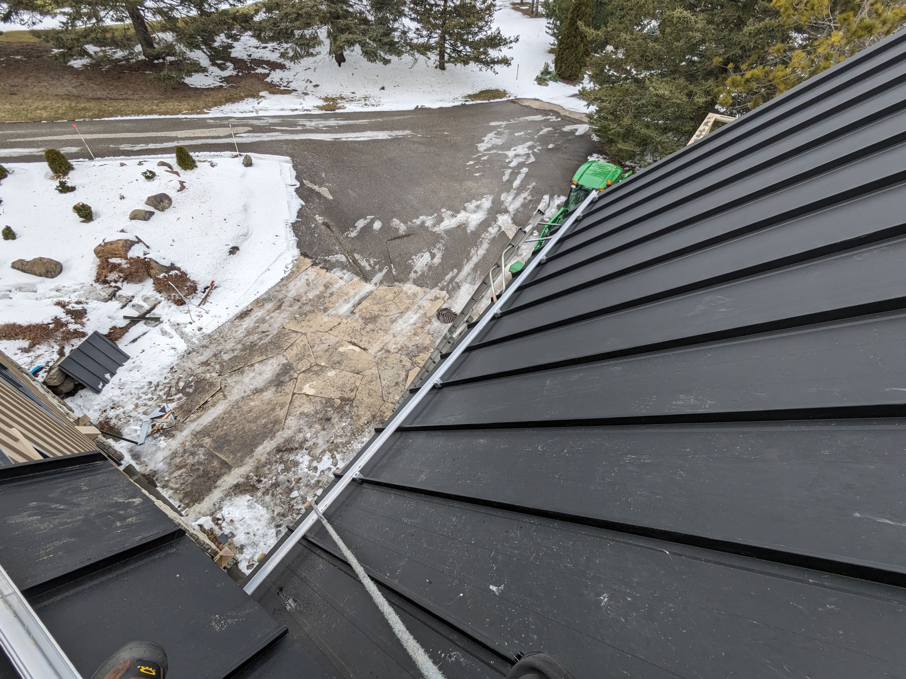 Residential Roofing Installation using 24 Ga Standing Seam Metal by Jay Carter Roofing & Sheet Metal