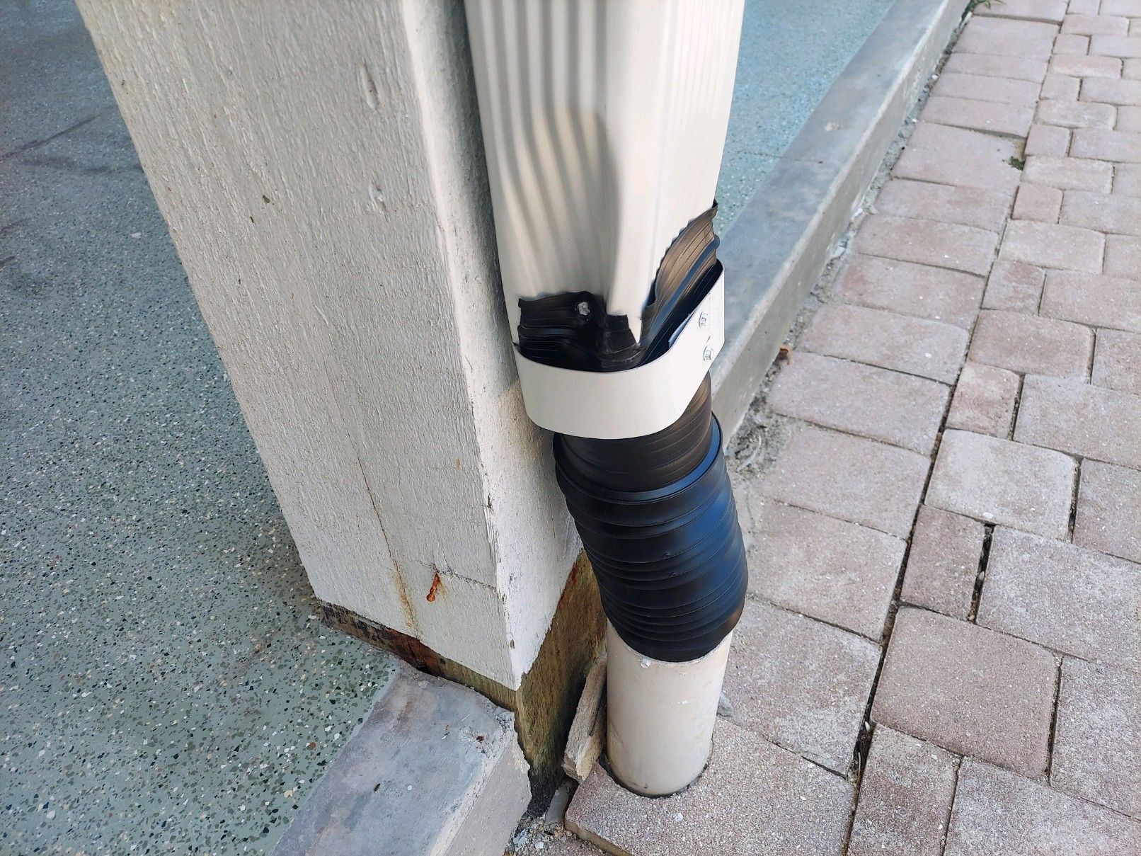 Downspout Installation using Downspout Extension in Sanibel FL by Gutter Professors