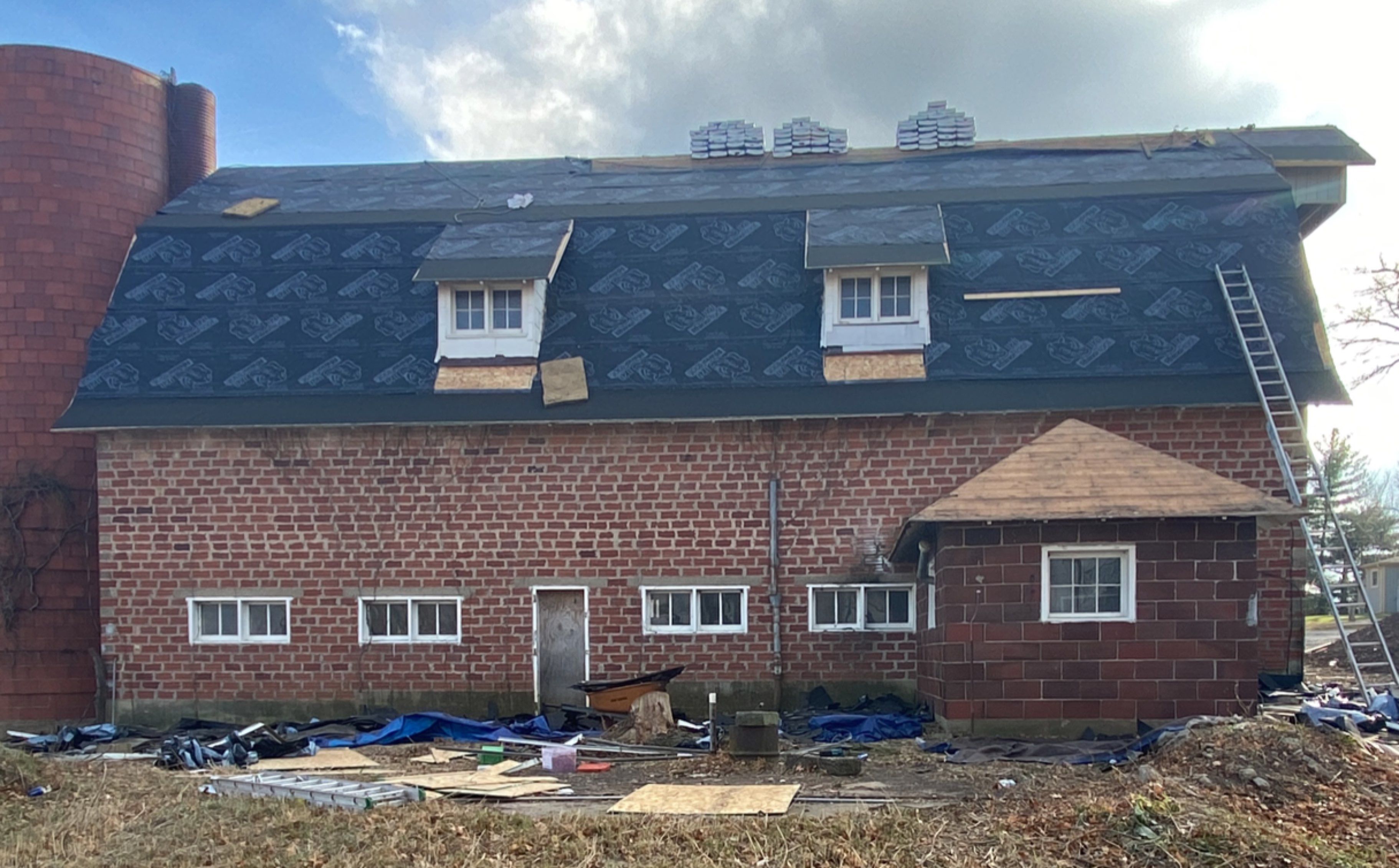 Roof Replacement with upgraded needed exhaust ventilation using Malarkey Vista Class III Impact Resistant Shingles in Black Oak color by Gorilla Exteriors Contracting, LLC
