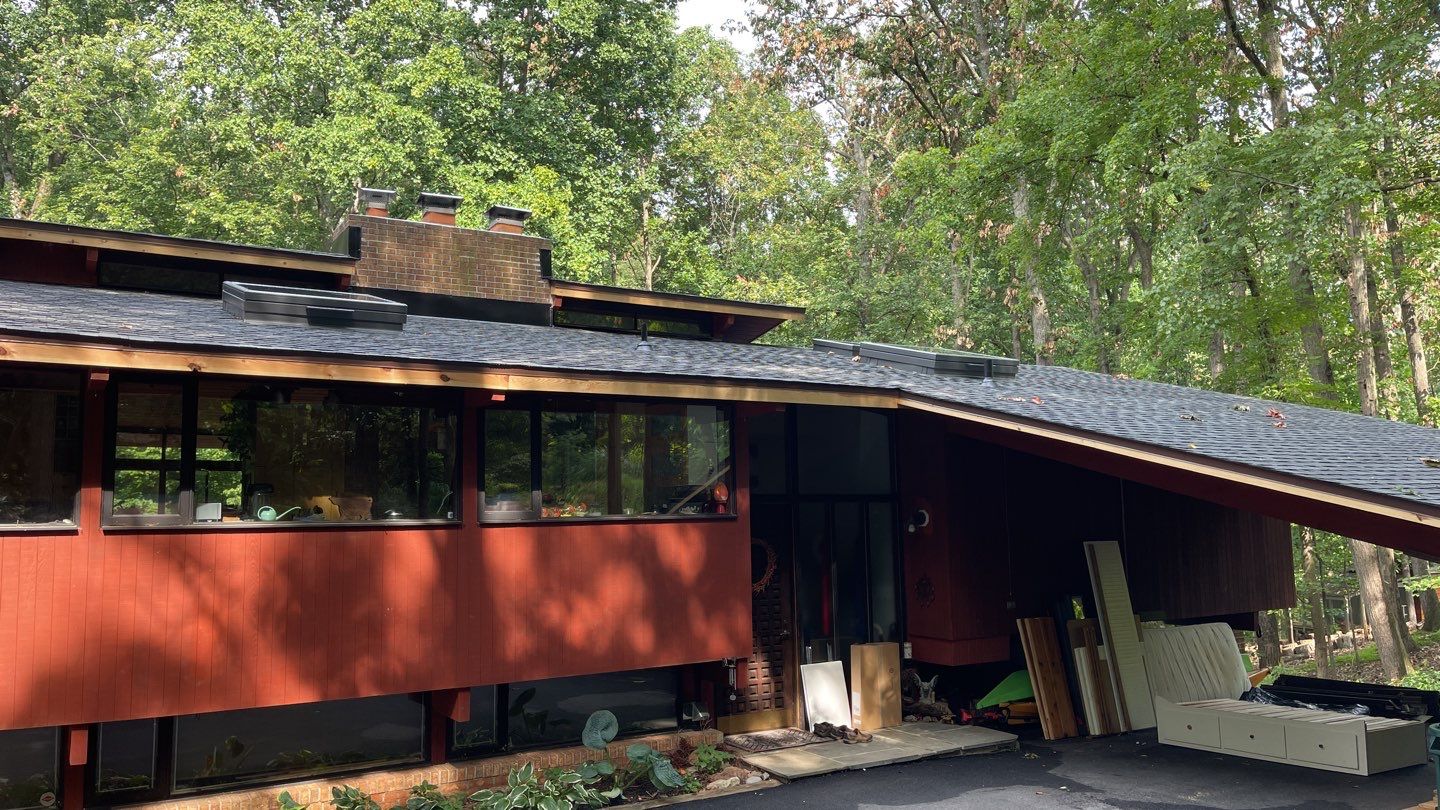 Deckhouse Roof Replacement by American Home Contractors