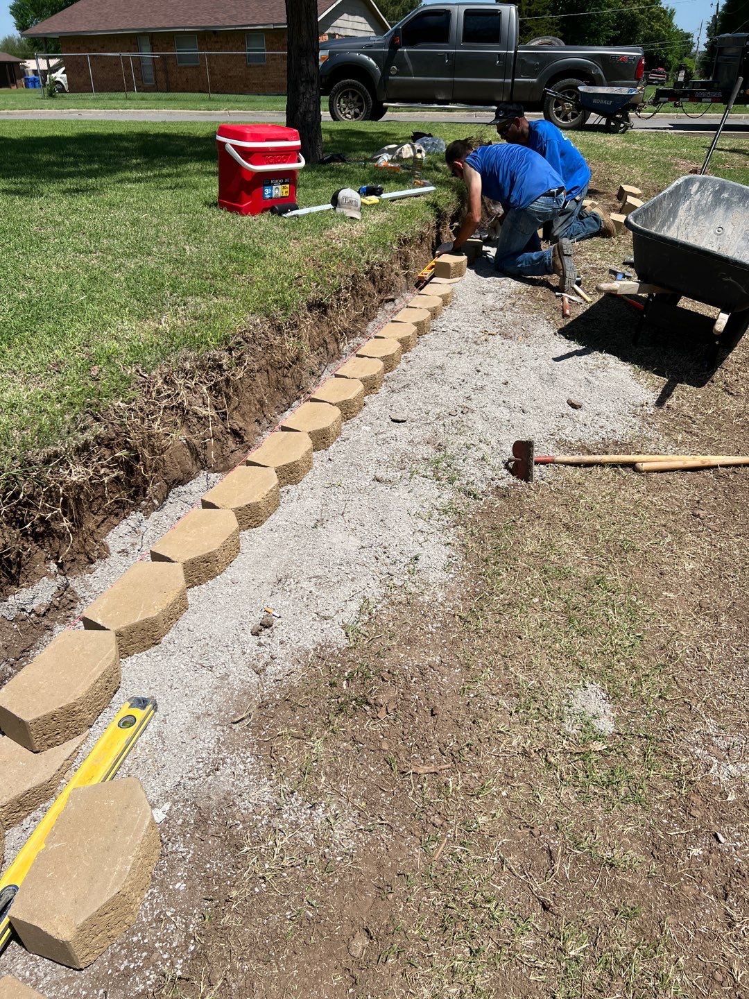 Retaining Wall using Rocks by Clays Services Inc