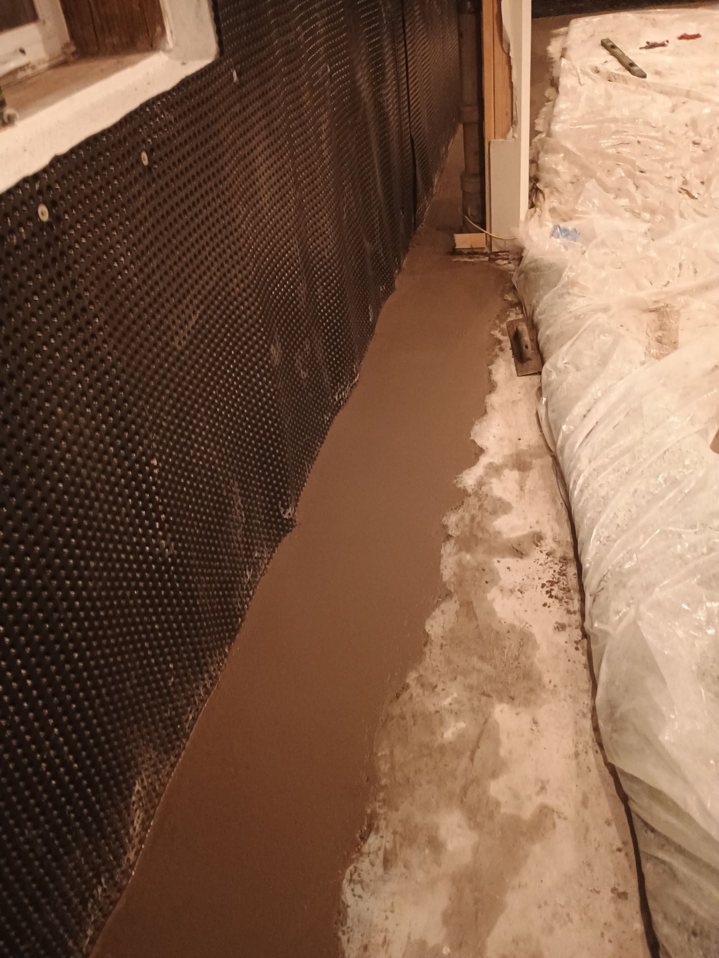 Investigating Groundwater Issues for RJ & Sally by Waterproofing Northeast