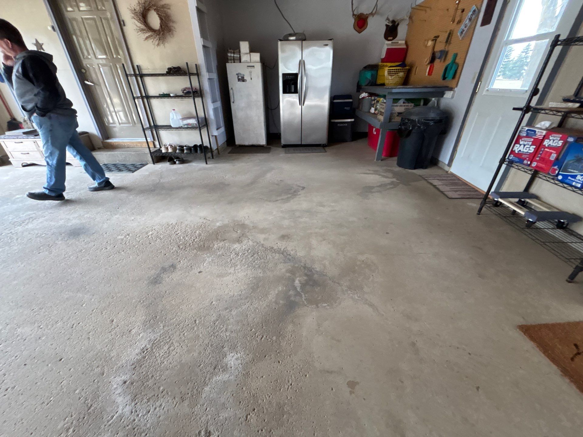 Full-Flake Epoxy Garage Floor Coating Installation in Sioux Falls by Select Painting, Coatings & Garage Cabinets