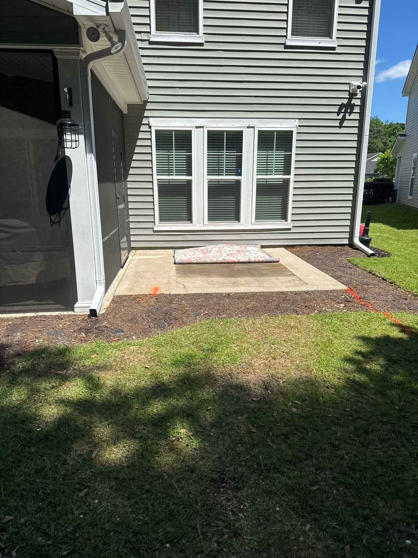 Custom Paver Patio Extension and Circular Fire Pit in Bluffton by Lowcountry Scapes, LLC