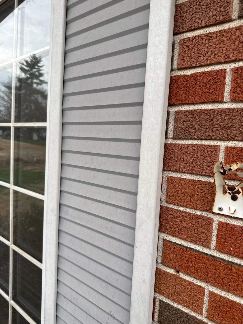 Exterior Metal Shutter Repainting - Fenton, MO by Legendary Services Company LLC.