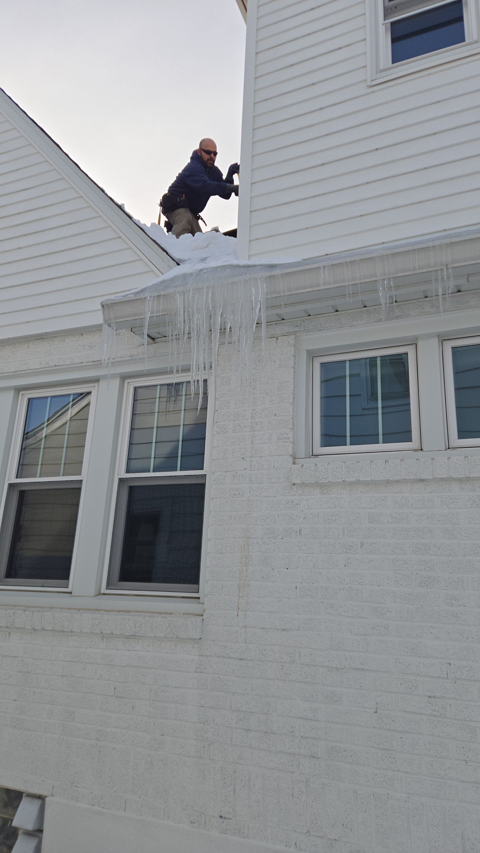 Massive Ice Dam Removal by Level Up Roofing and Restoration Services LLC