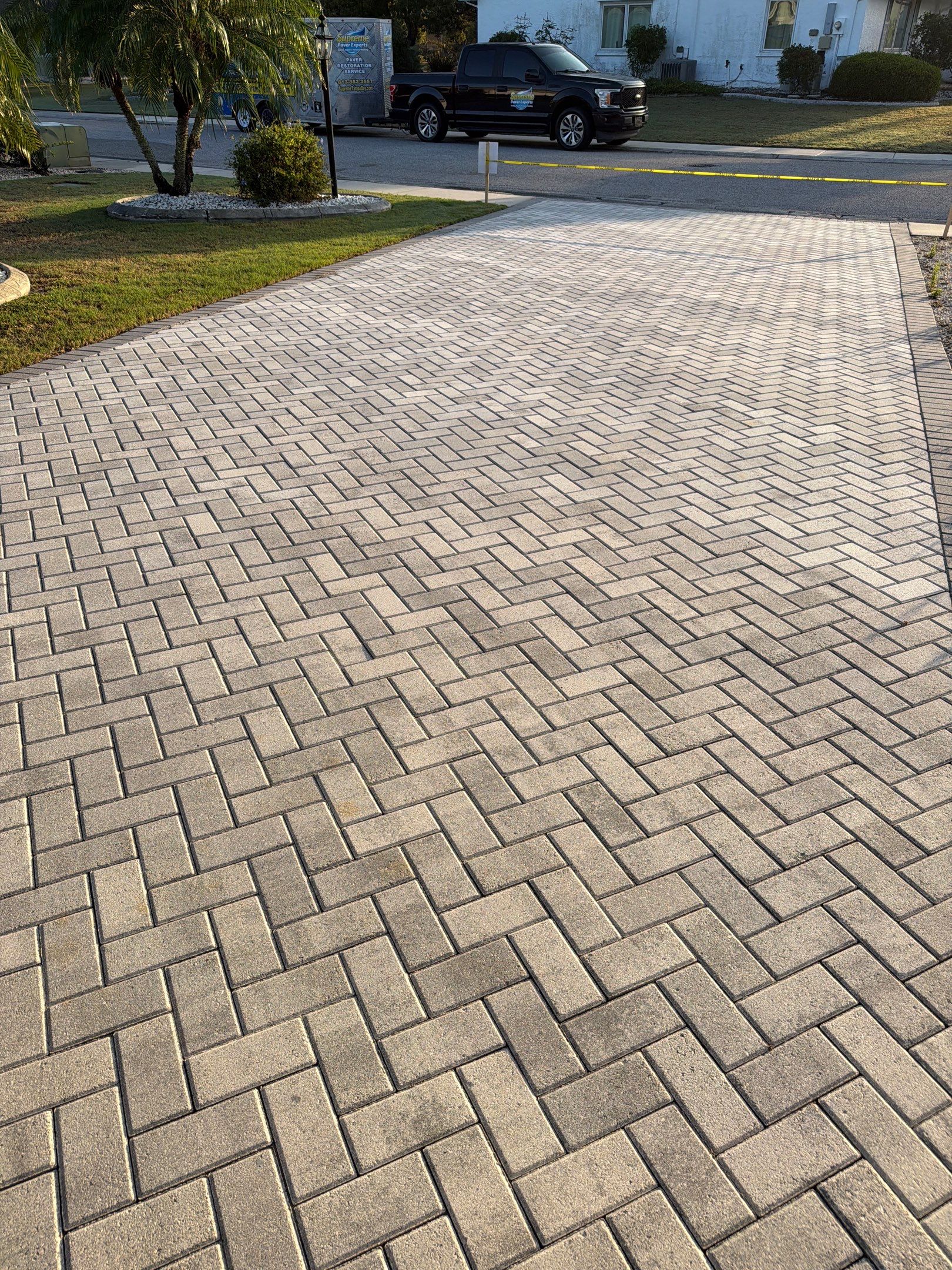 Paver Sealing and Cleaning for Herringbone Driveway in Sun City Center by Supreme Paver Experts