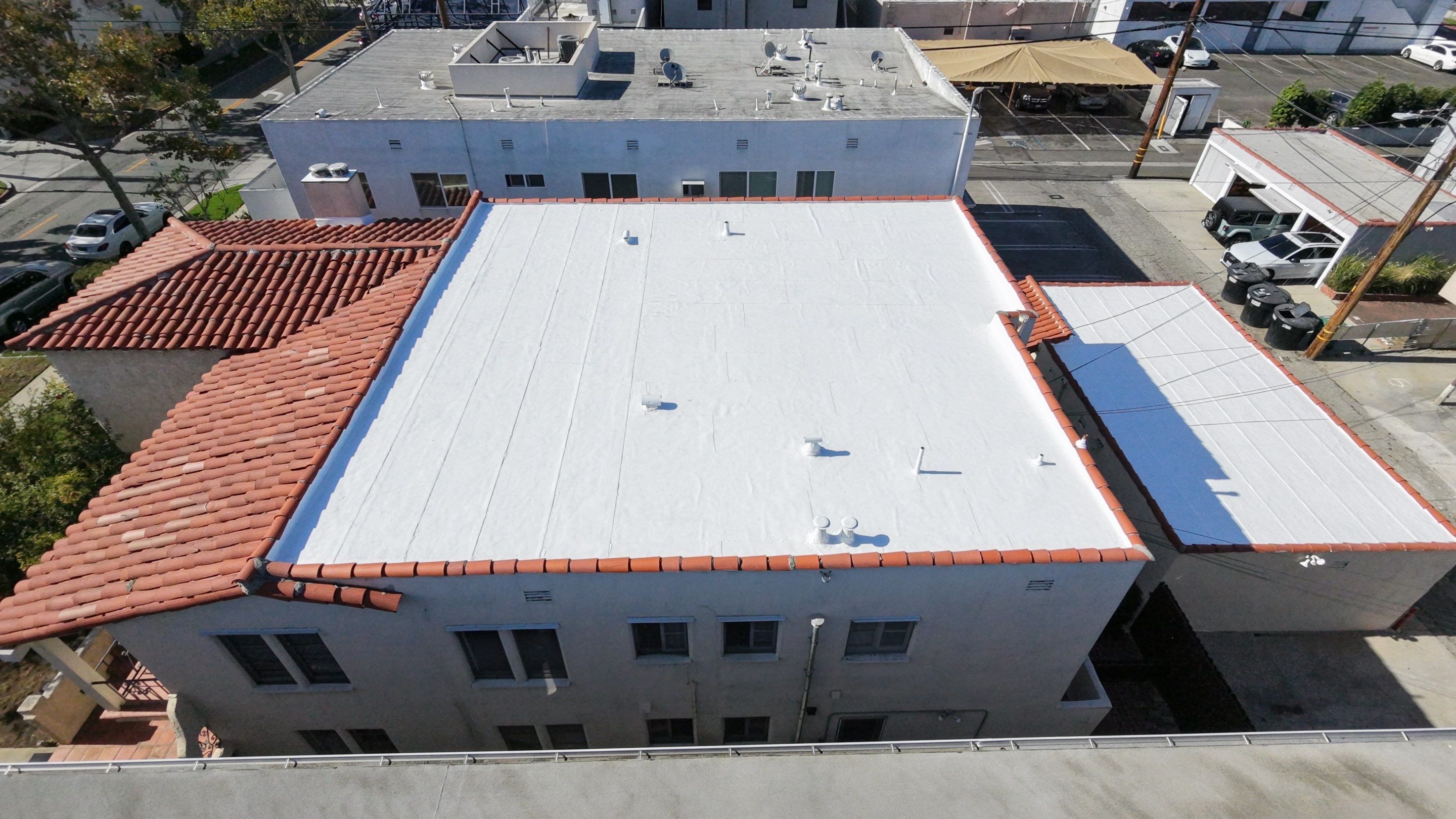 Beverly Hills Flat Roof Coating and Terracotta Tile Reset by Hull Brothers Roofing