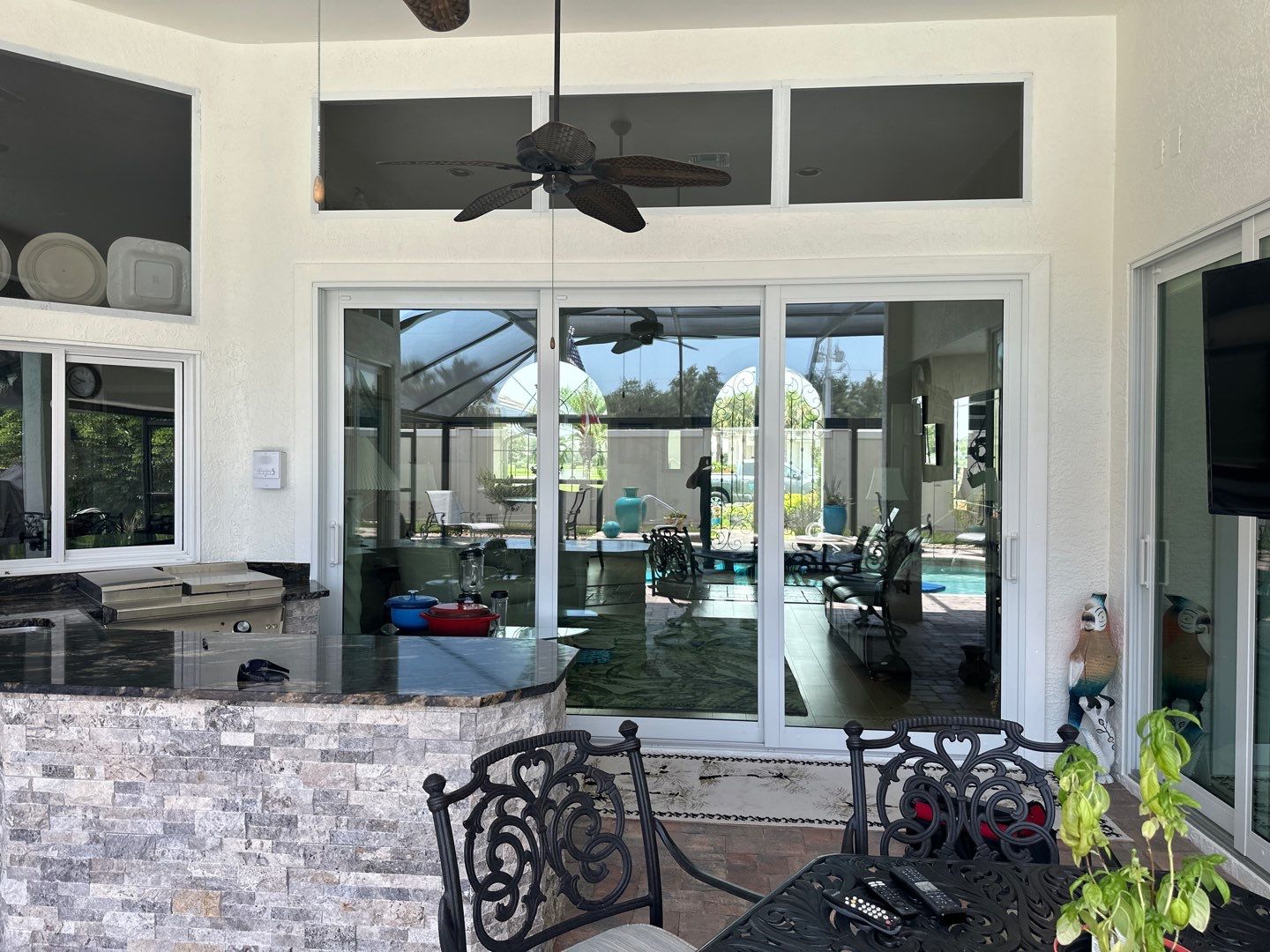 Window Installation using PGT Aluminum for the doors and PGT Vinyl for the Windows  by Windows For Life 