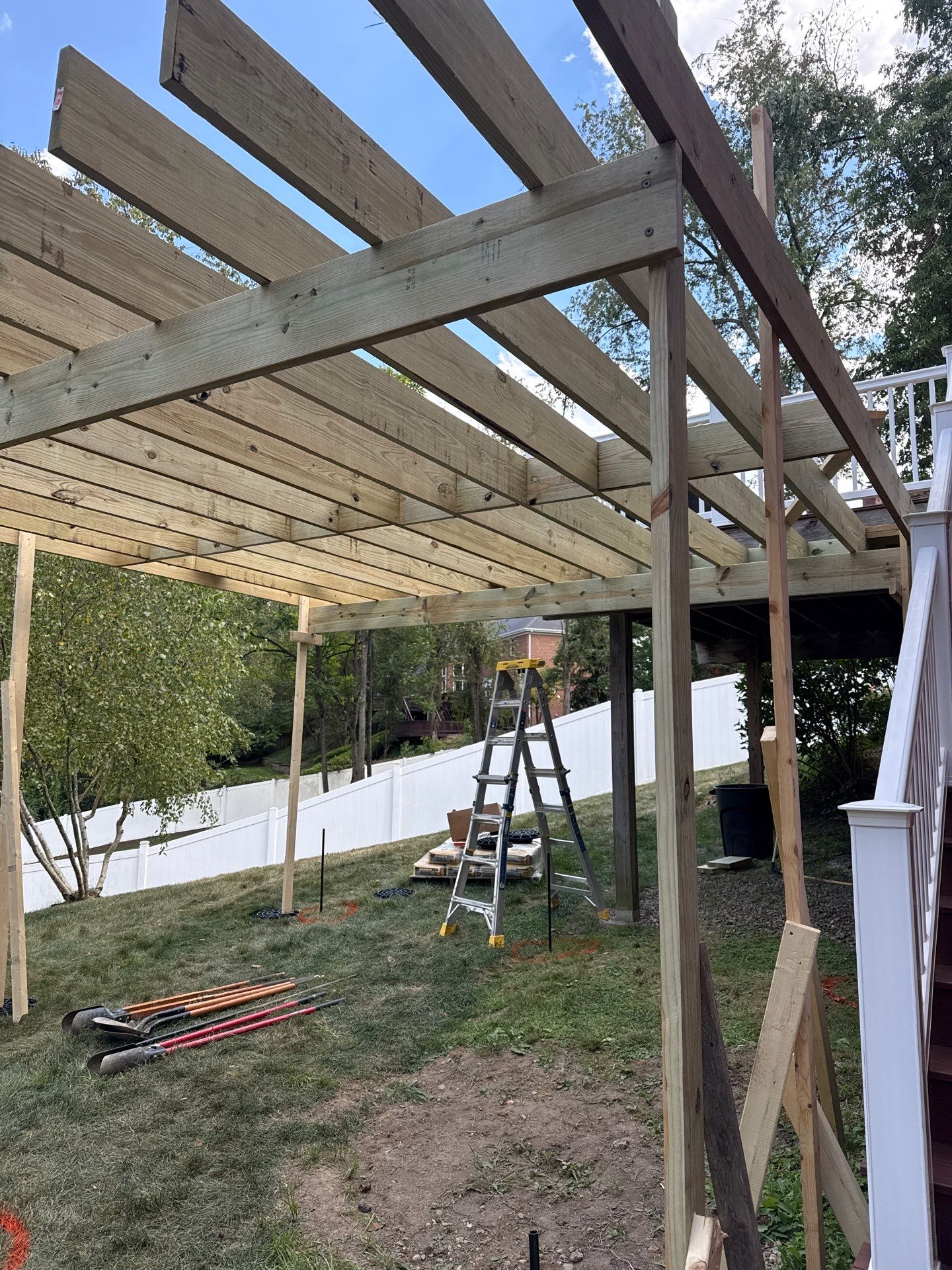 Deck extension  by Cousins Roofing Siding & Decks