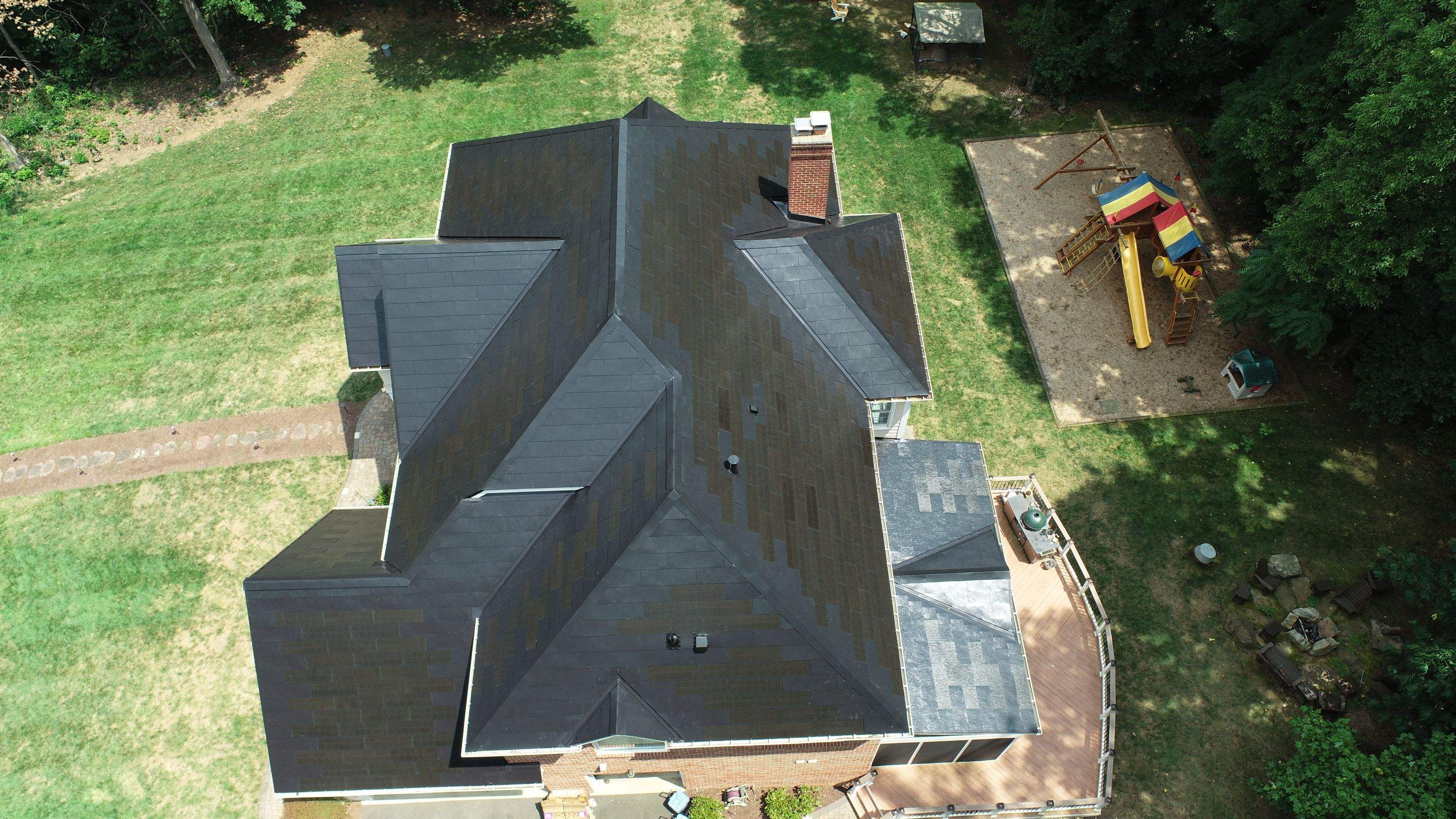 Tesla Solar Roof with Powerwall Storage by American Home Contractors