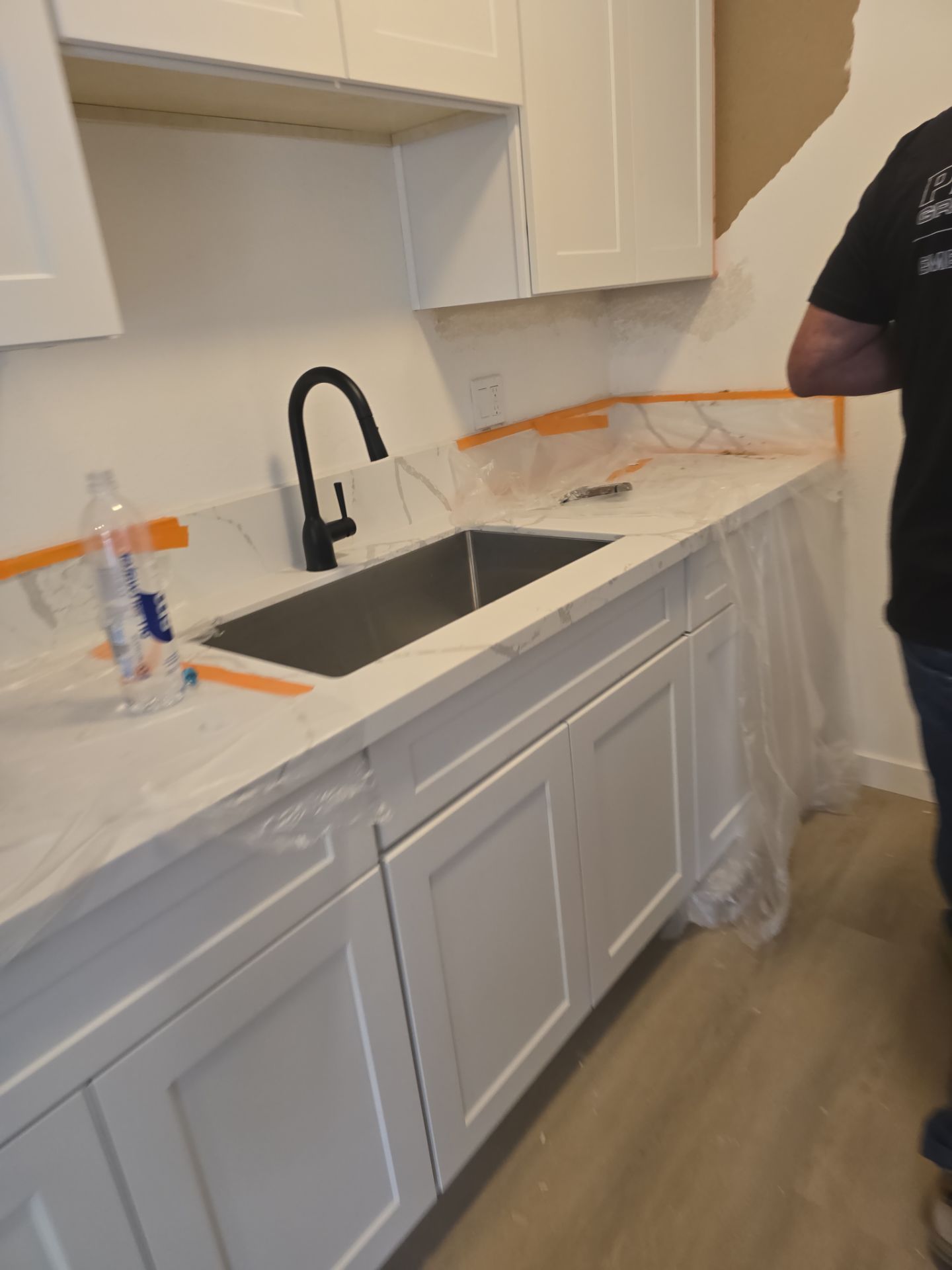 Scope of Work: Installation of Shower, Toilet, Plumbing, Kitchen Sink, and Fixtures by Us Plumbing 