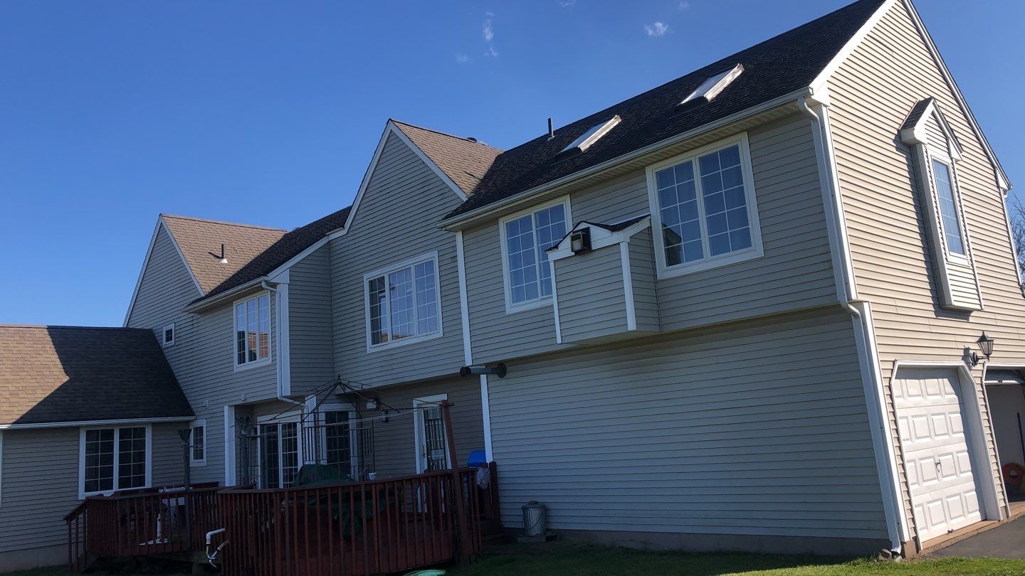 Commercial Roofing Installation using Owens Corning TruDefinition driftwood by A Plus Exterior