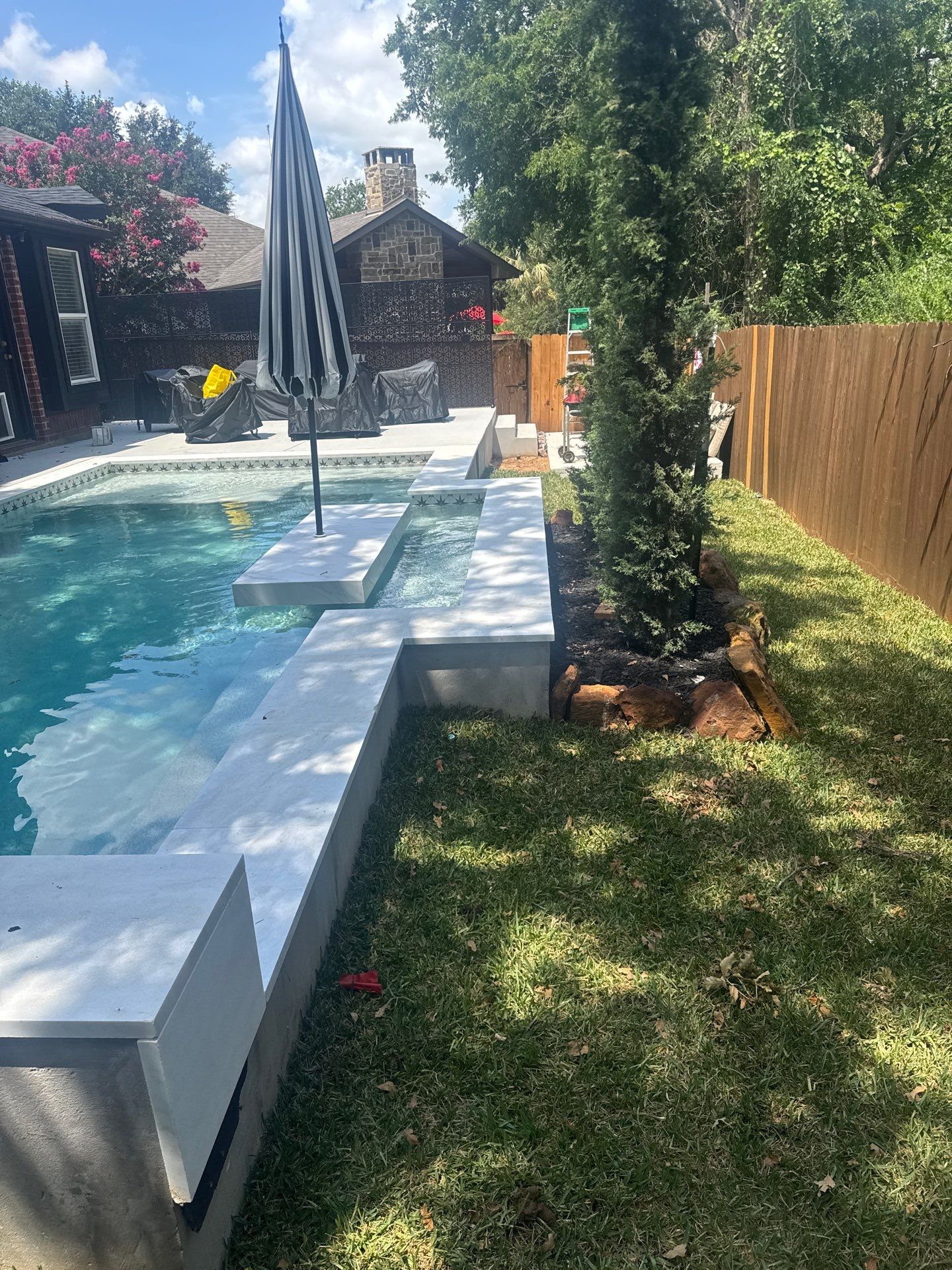 Geometric Pool with Raised Spa and White Coping by Pinnacle Pools and Spas - DFW