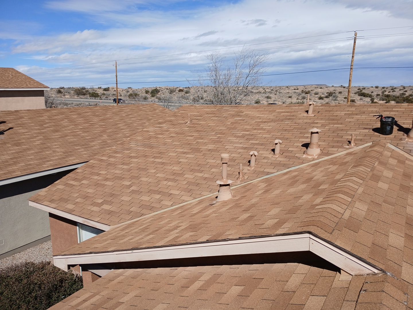 Wind damage repairs and maintenance in Rio Rancho by Doyle Roof Masters Inc
