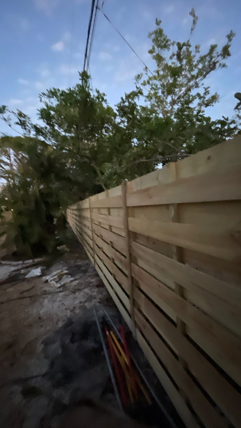 Wood Fence Installation using Horizontal Shadowbox Wood Privacy Fence by Asap fence and gates, LLC
