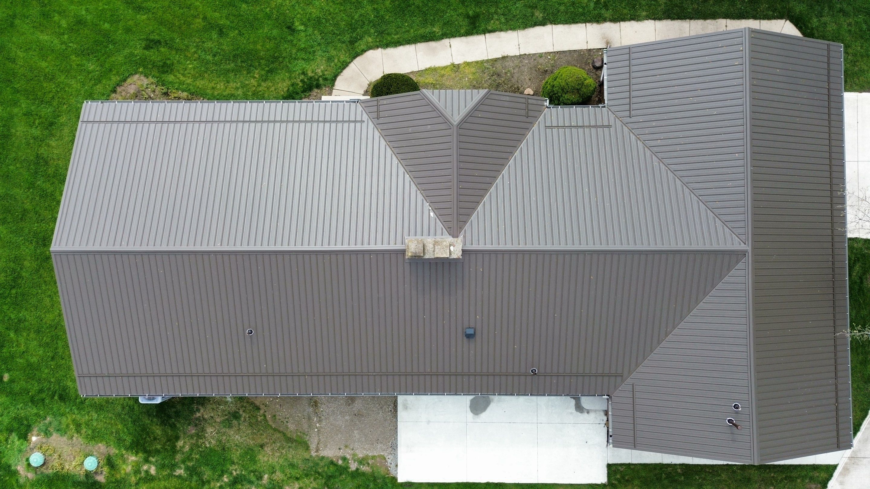 Residential Roofing Installation using Performance Panel Metal - Crinkle Bronze by RoofX 